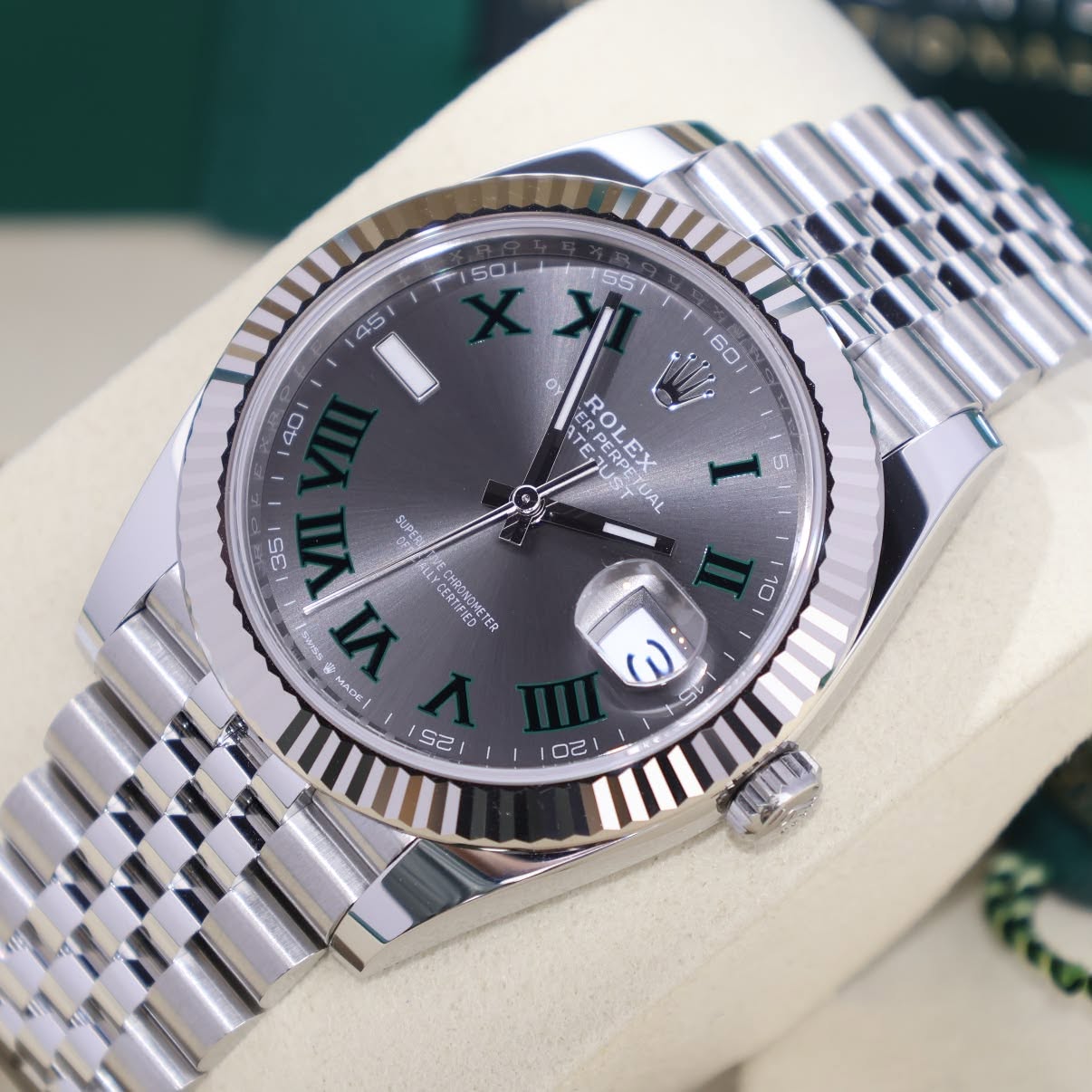 May be an image of wrist watch and text