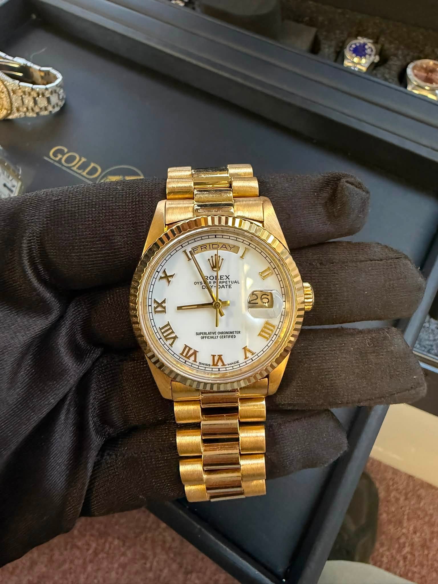May be an image of wrist watch and text