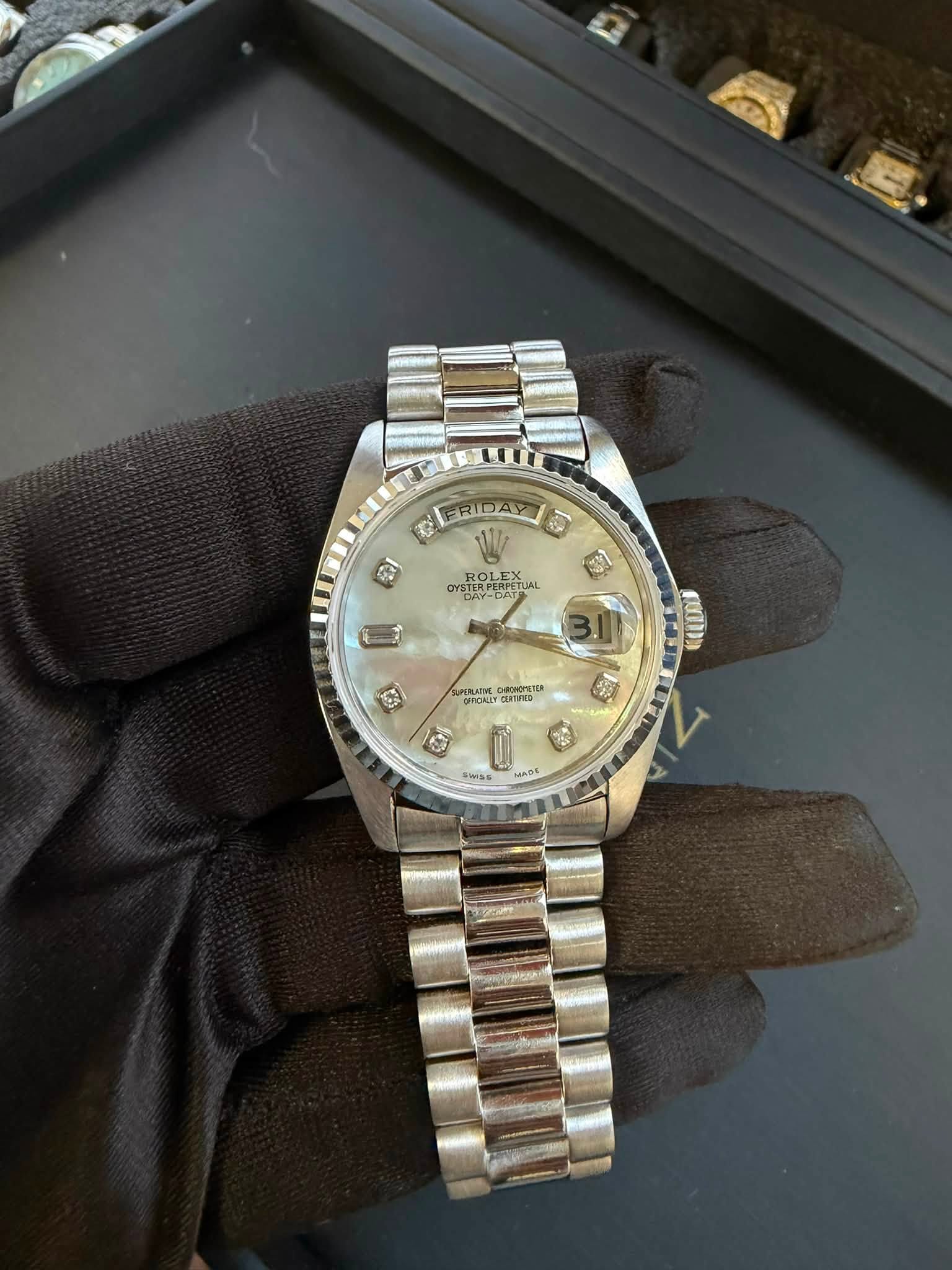 May be an image of wrist watch and text