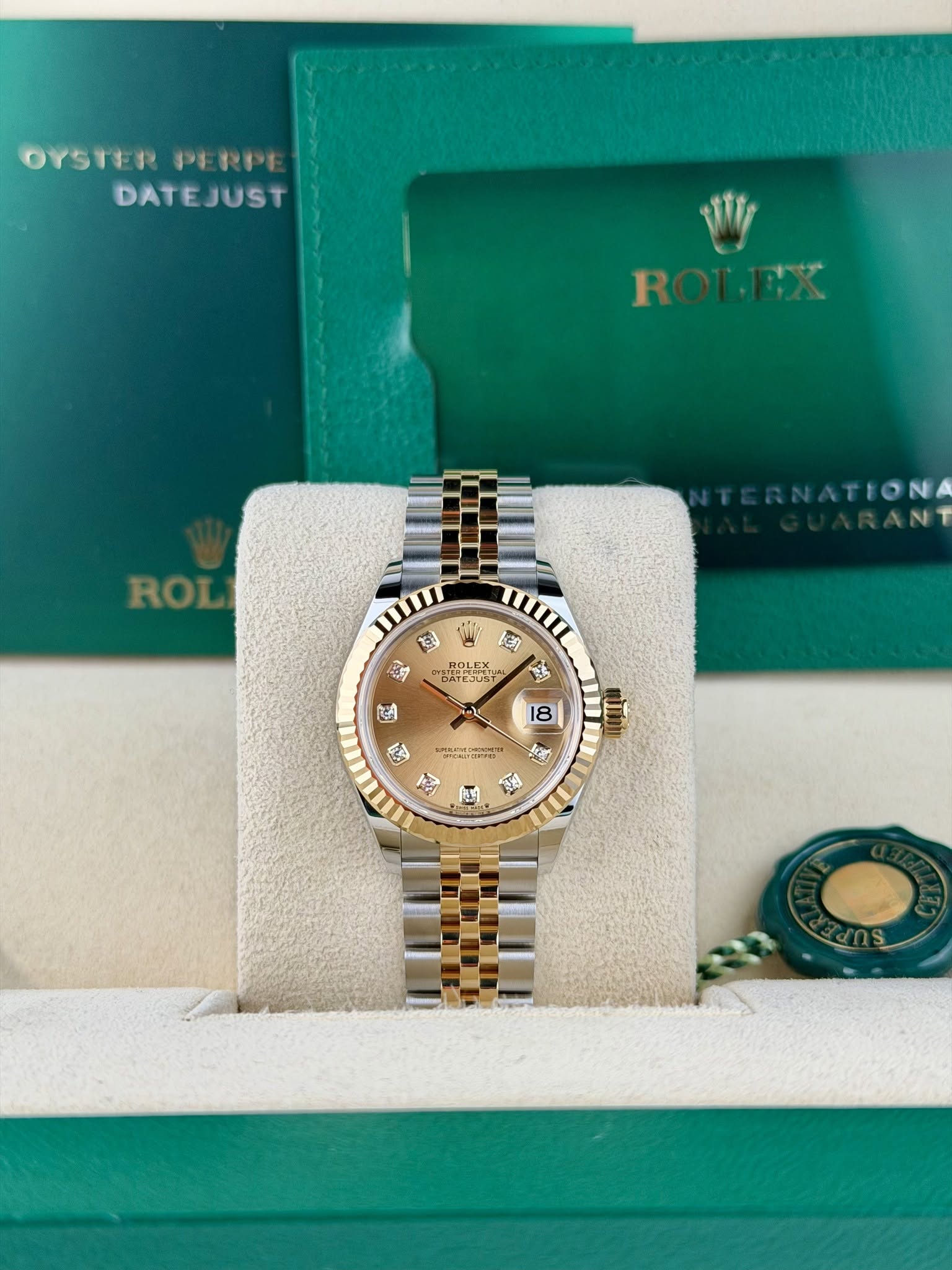 May be an image of wrist watch and text