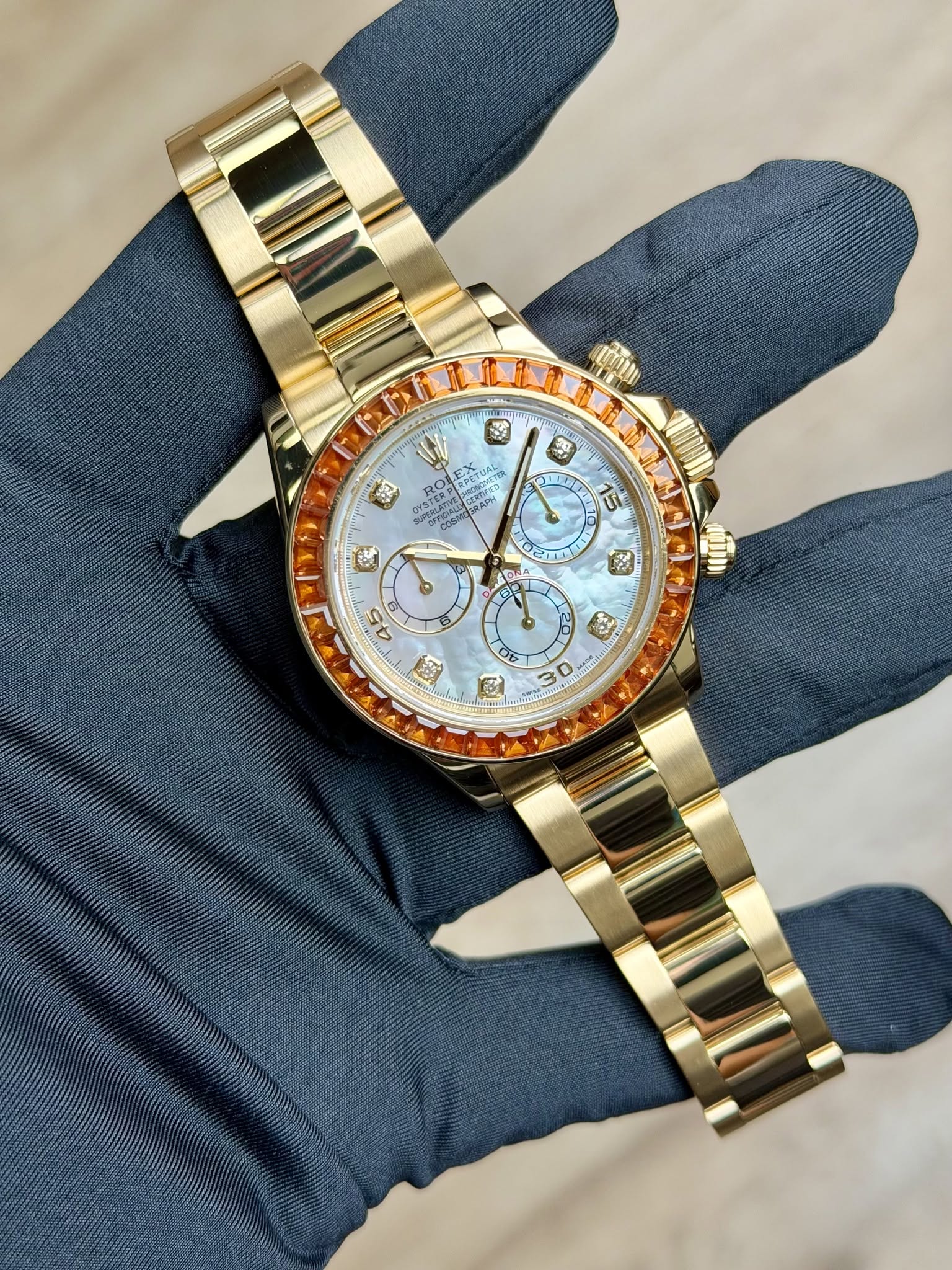 May be an image of wrist watch and text