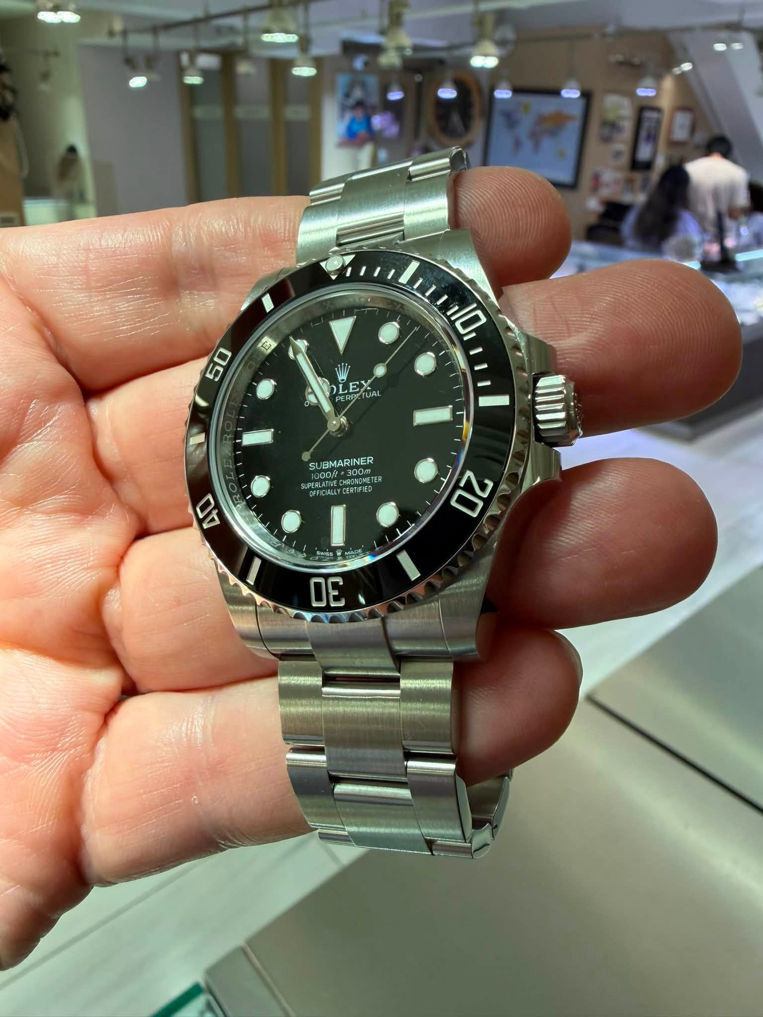 May be an image of wrist watch and text that says '50 10 LEX 1 ل SU LOMARINER ITVED ഫ וומחו 40 20 30'