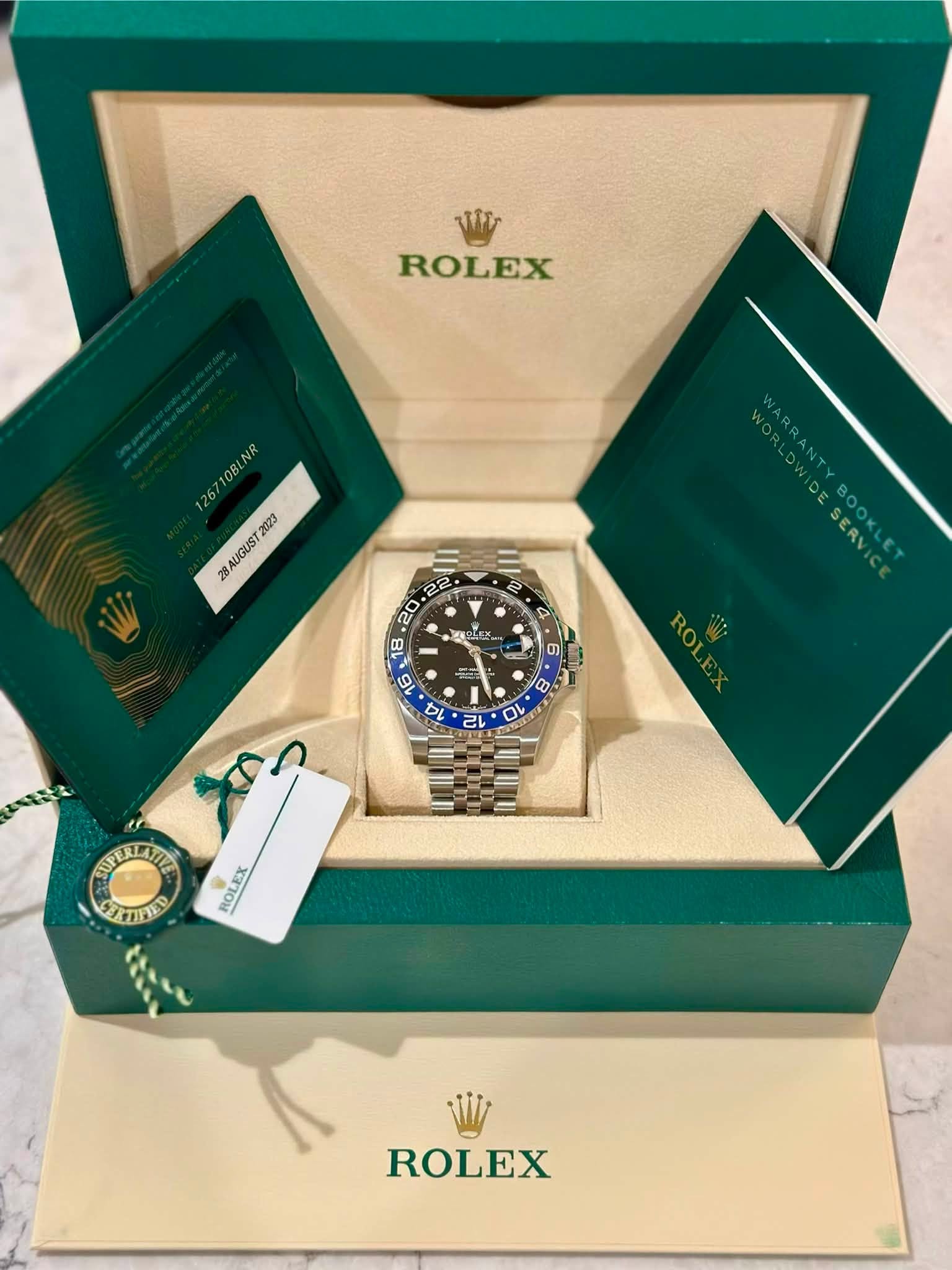 May be an image of wrist watch and text that says 'ROLEX 267108LNR 28AUGUST2023 2023 BOOK 15 SMEK 4 4 b M 14 ह دال 0 O 0 N PE ΕΡΕΙΜΑΝΣ TLAIZ ΑΓEΛΕΙA ROLEX ROLE ROLEX'