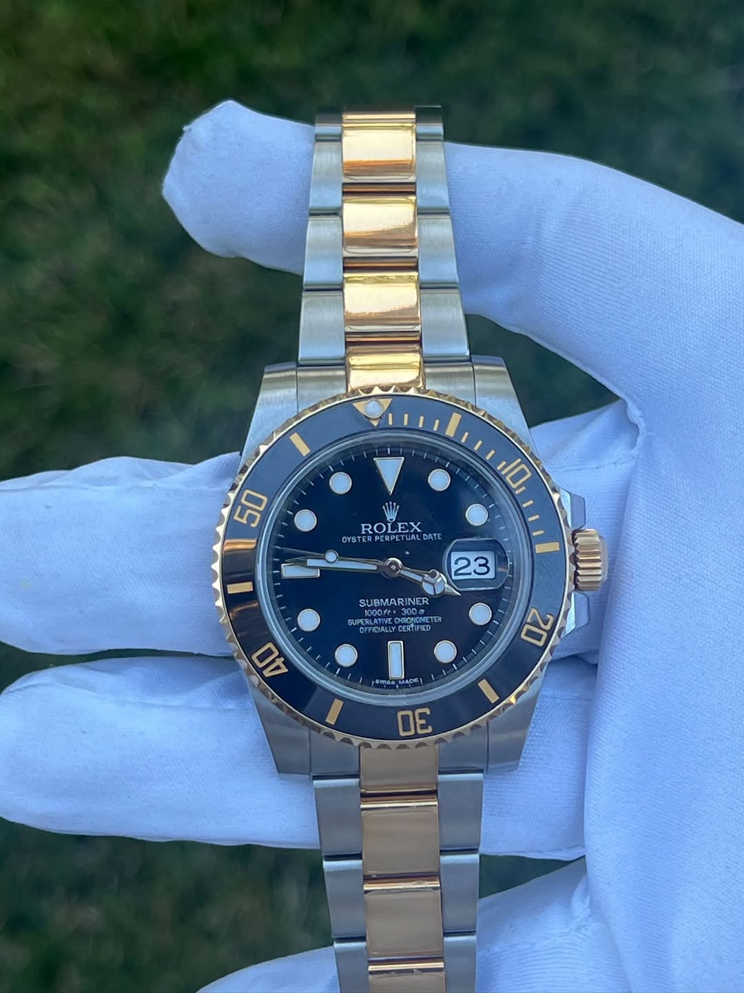 May be an image of wrist watch and text