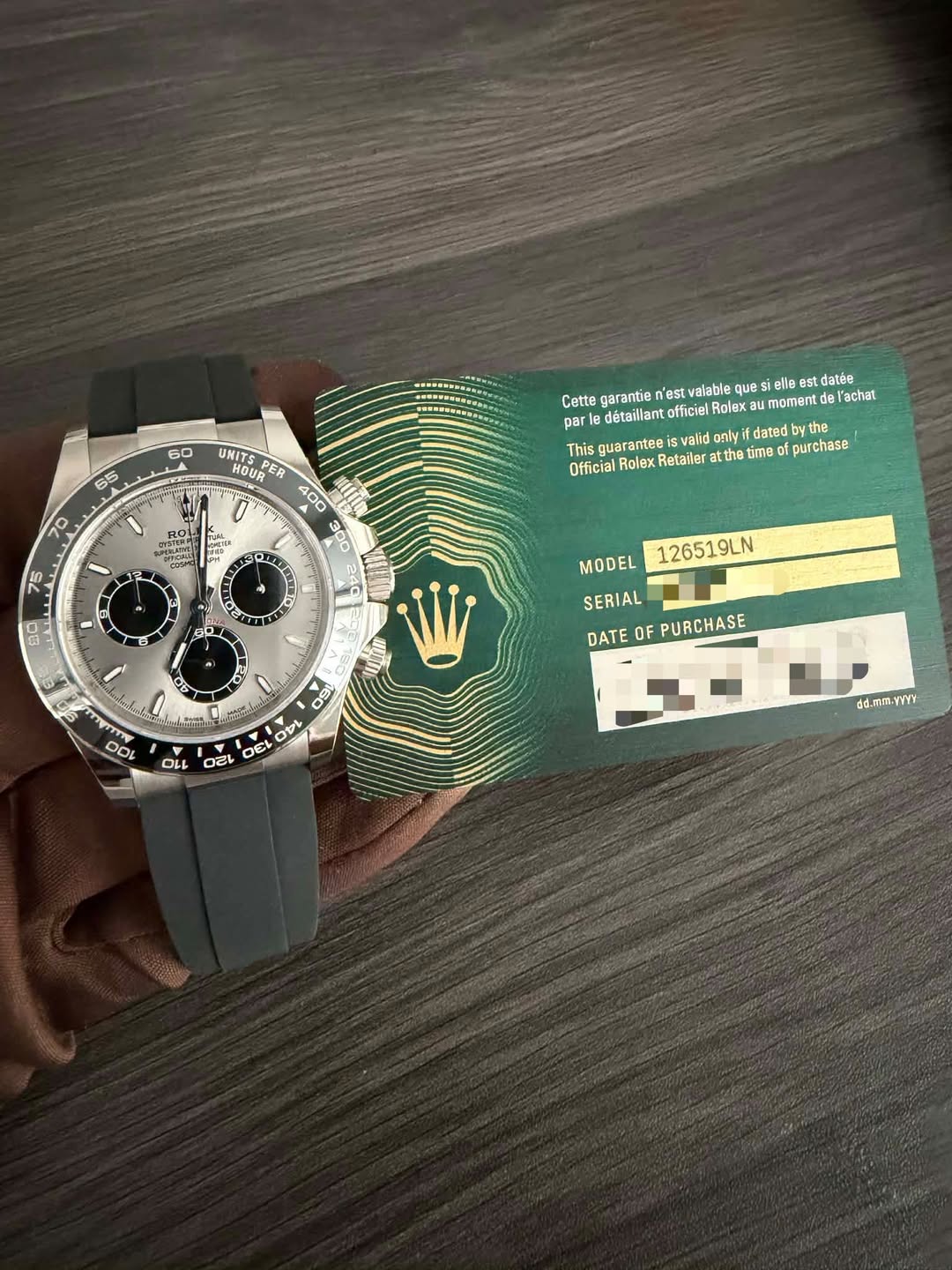 May be an image of wrist watch and text that says '60 65 UNITS HOUR UNITSPER PER Cette carantie n'est valable ues elle est datée moment Vachat par détaillan officiel Ralex…