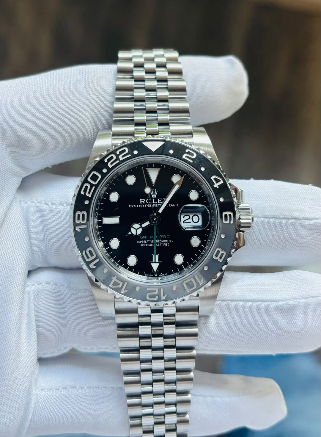 May be an image of wrist watch and text