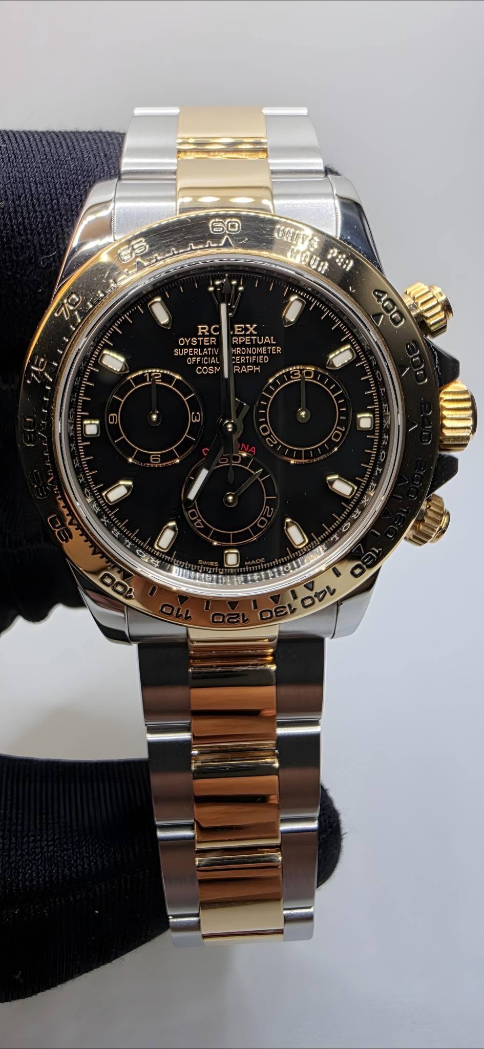 May be an image of wrist watch and text