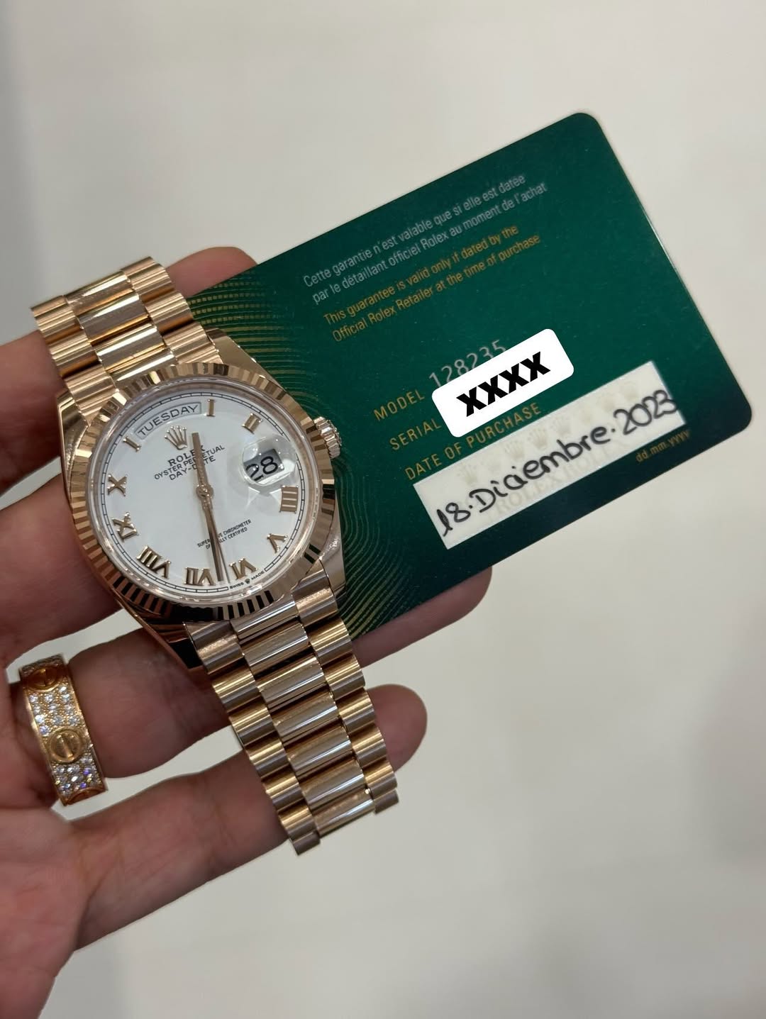 May be an image of wrist watch and text