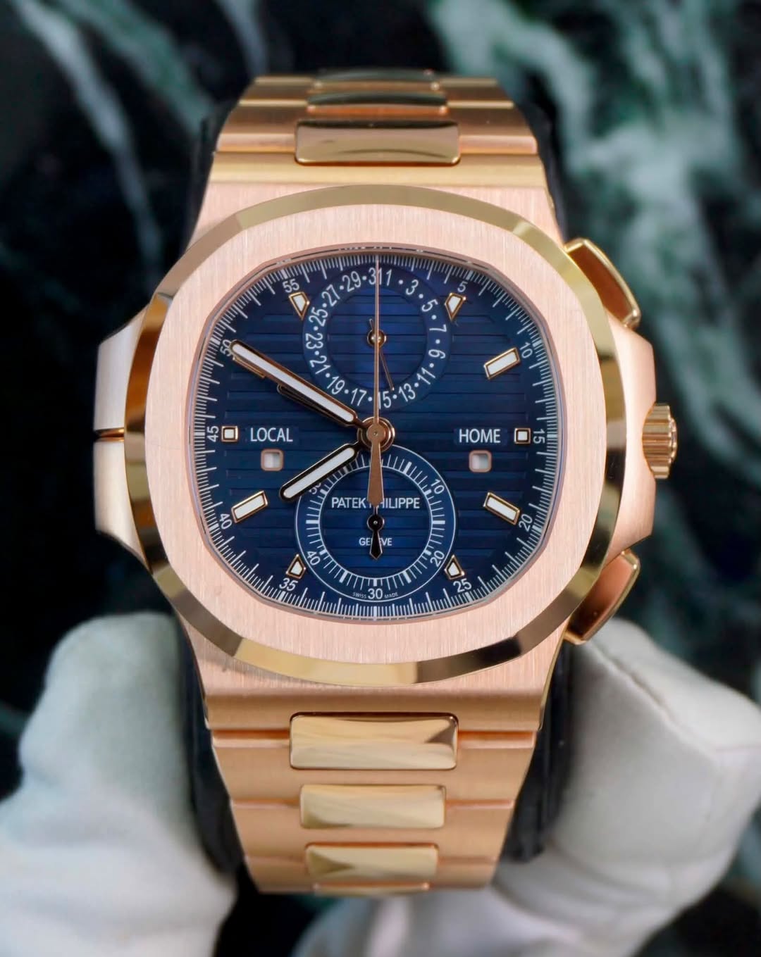 May be an image of wrist watch and text that says ' ° LOCAL 9 10 50 ጣጣ mngna 20 HOME L - 15 5 PATEK EK ILIPPE GEI IVE 20 40 S '