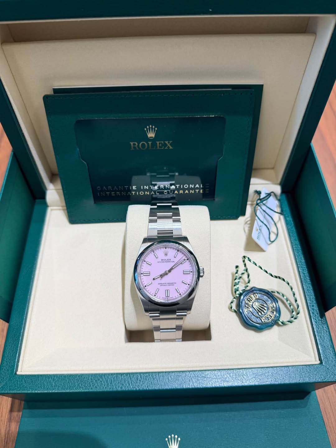 May be an image of wrist watch and text