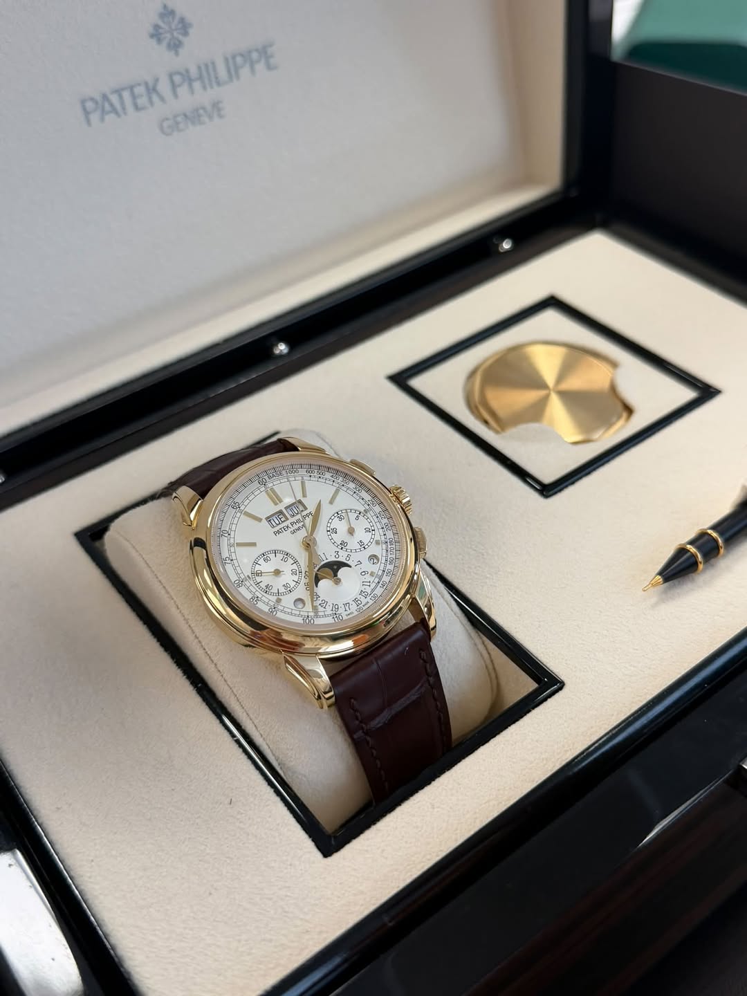 May be an image of wrist watch and text