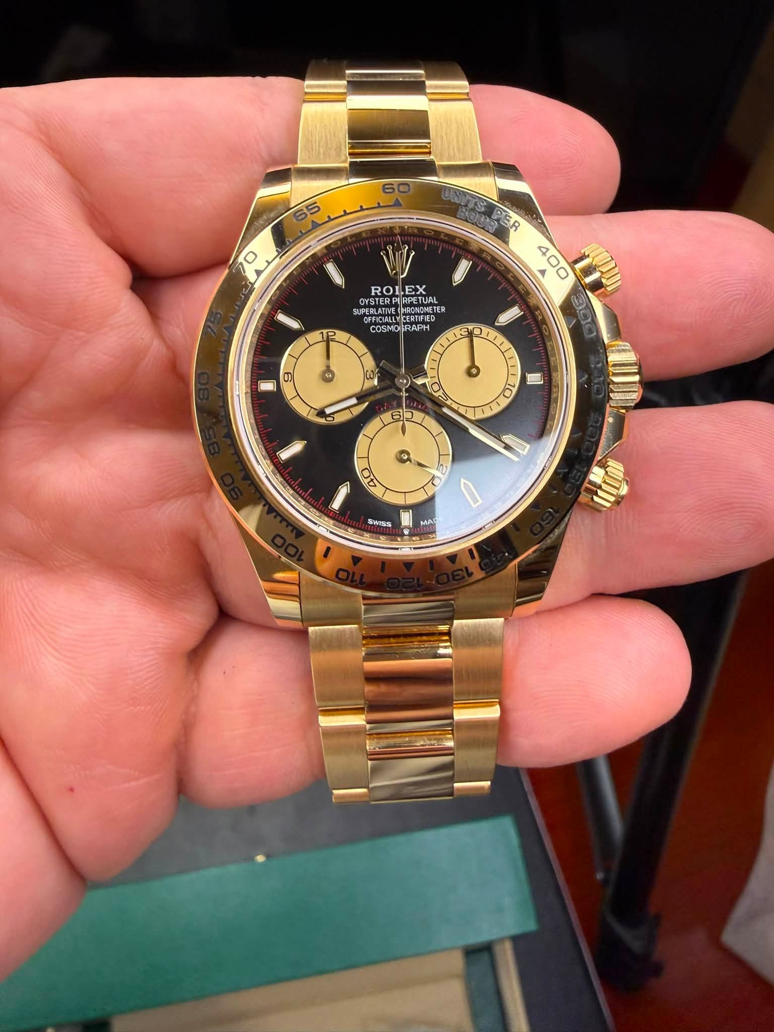 May be an image of wrist watch and text