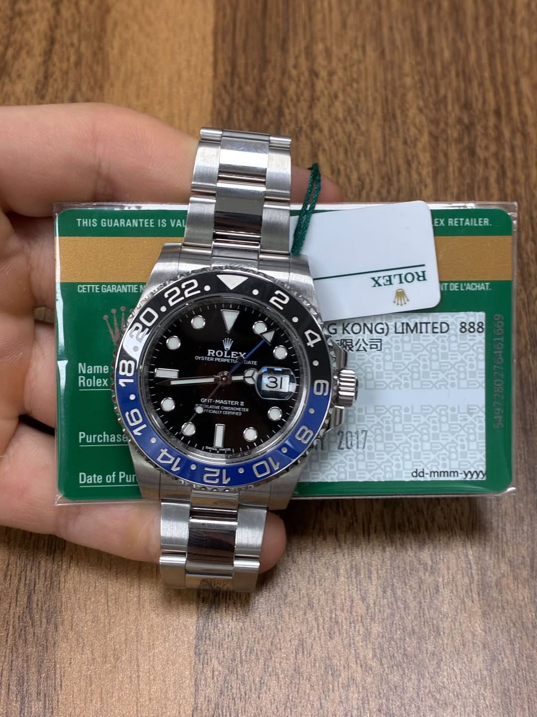 May be an image of wrist watch and text that says 'THIS GUARANTEE THISGUARANTEEISVAL IS VAL EX RETAILER. CETTE GARANTIE 22 20 2 XELOR DEL L'ACHAT. Name Rolex ROLEX GKONG)…