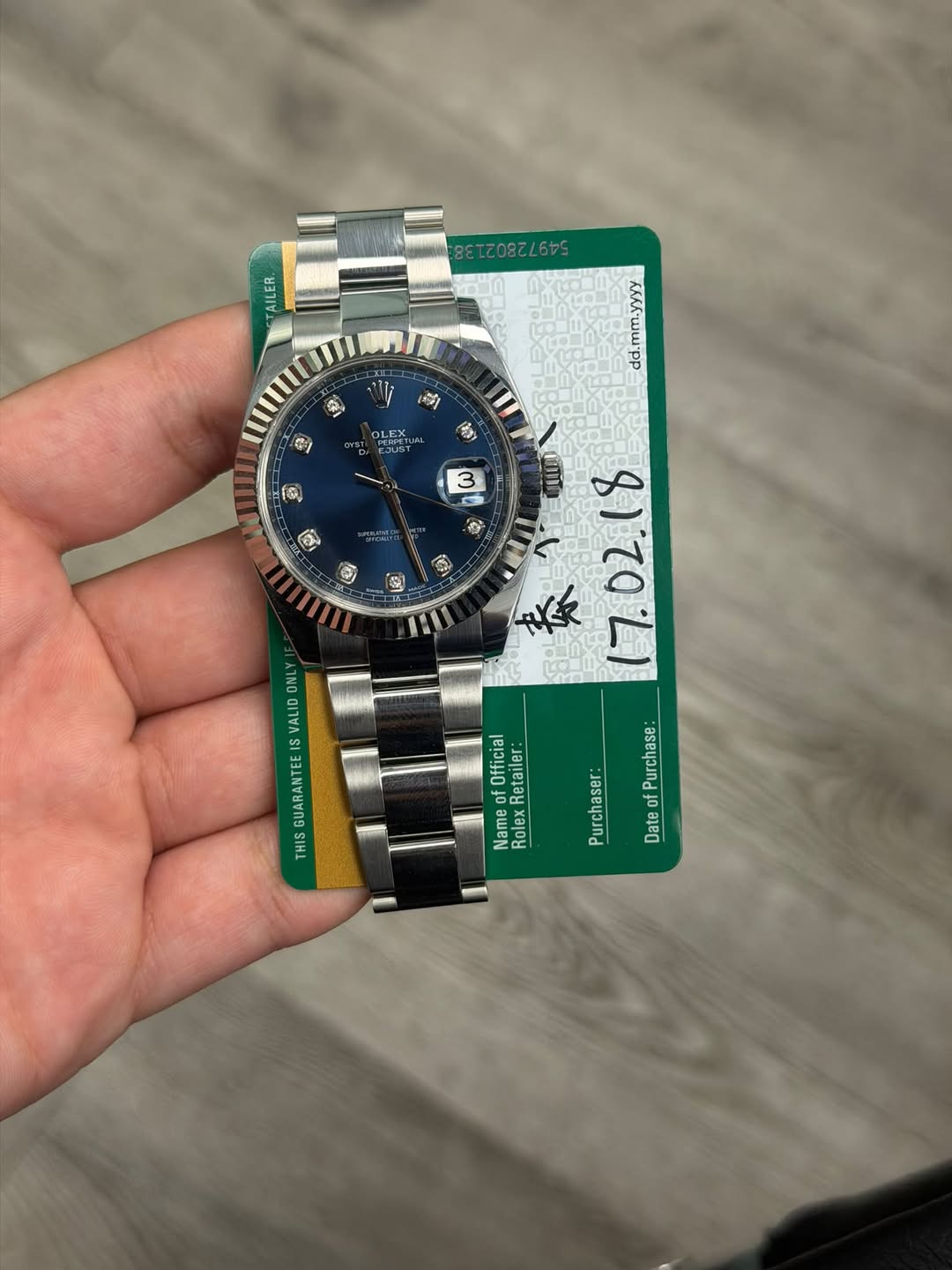 May be an image of wrist watch and text that says ' G 41 前 金 OLEX GYSTO EJUST aUST O 3 SAORN ទ 4 C DNL ALI SVALID IS INAIINI9 TIHT 森 17.02.10 Purchase: Purchaser: DateofPurchase:…