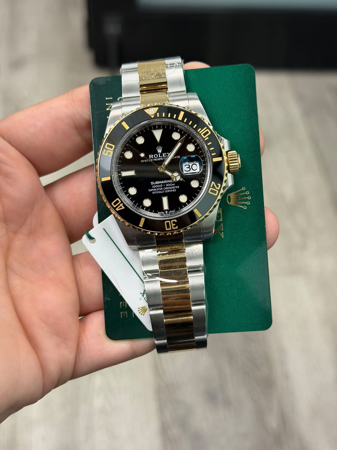 May be an image of wrist watch and text