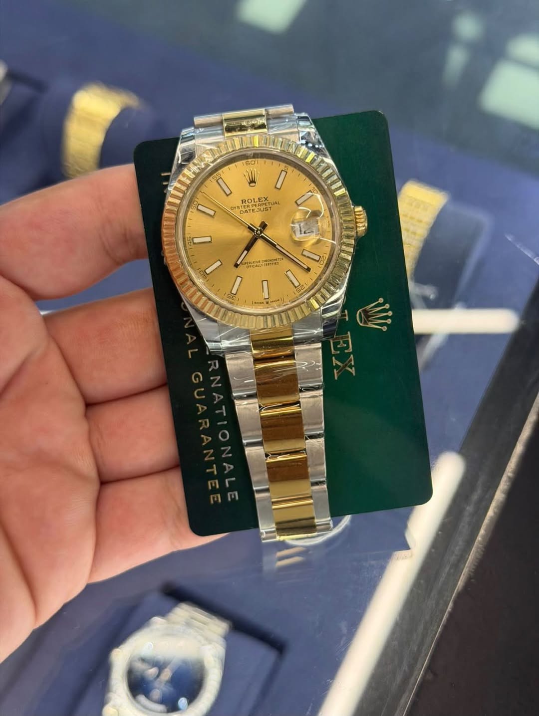 May be an image of wrist watch and text