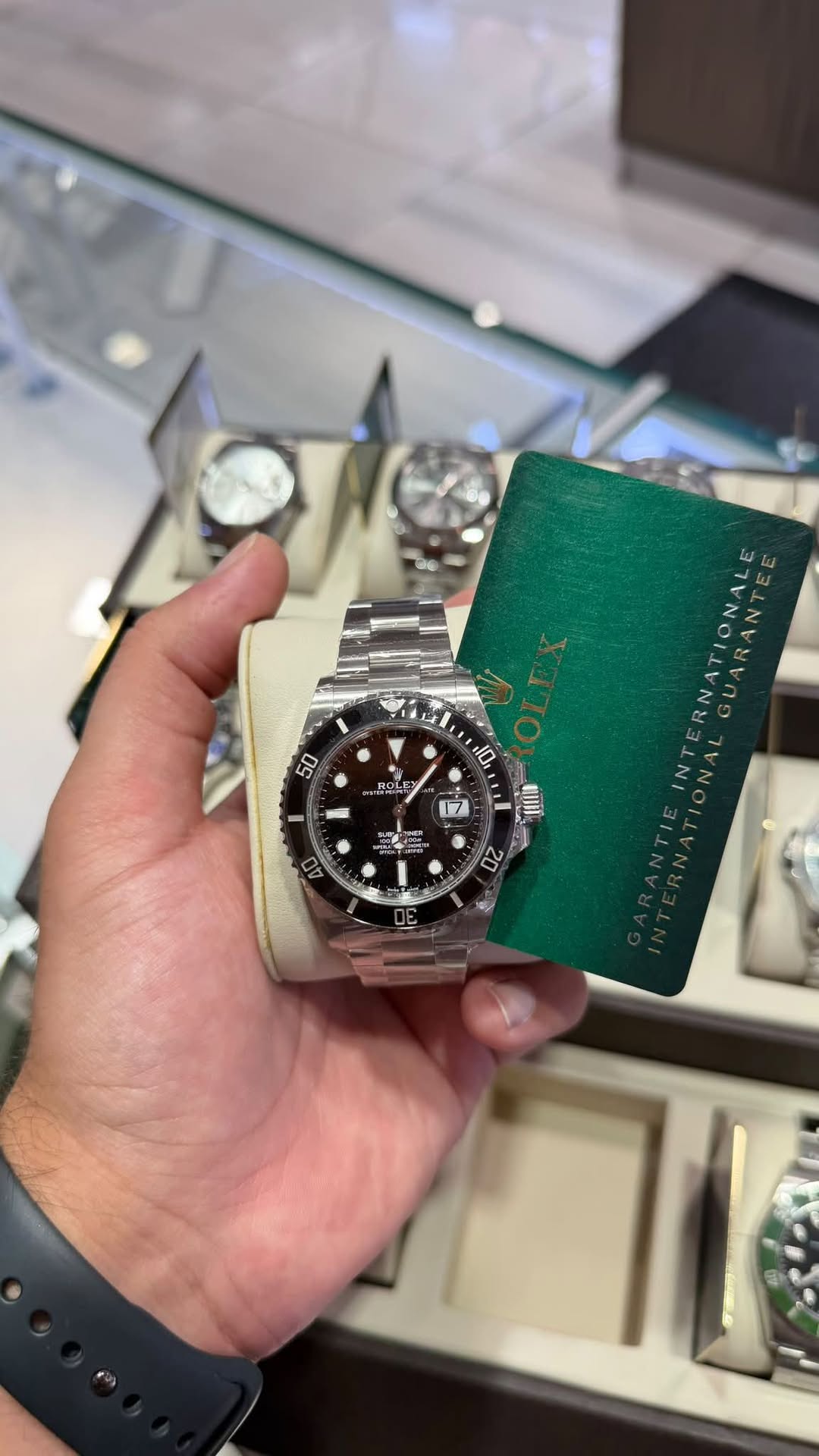 May be an image of wrist watch and text