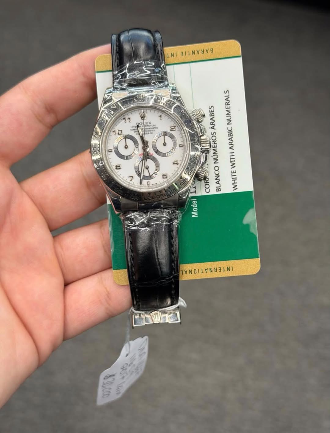 May be an image of wrist watch and text