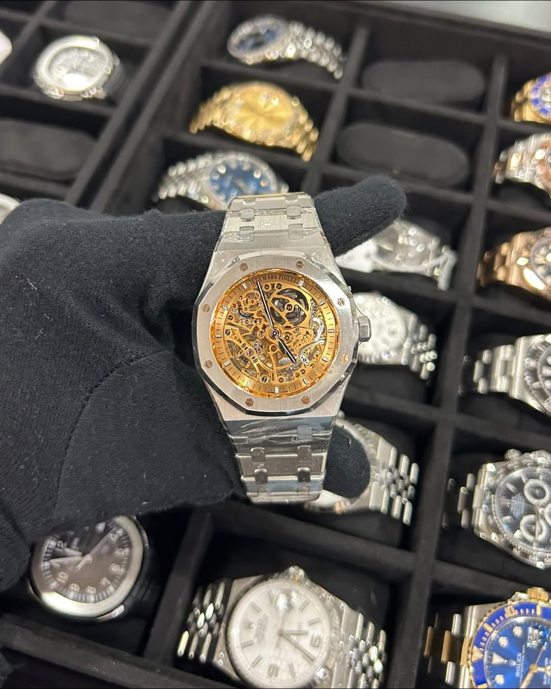 May be an image of wrist watch and text