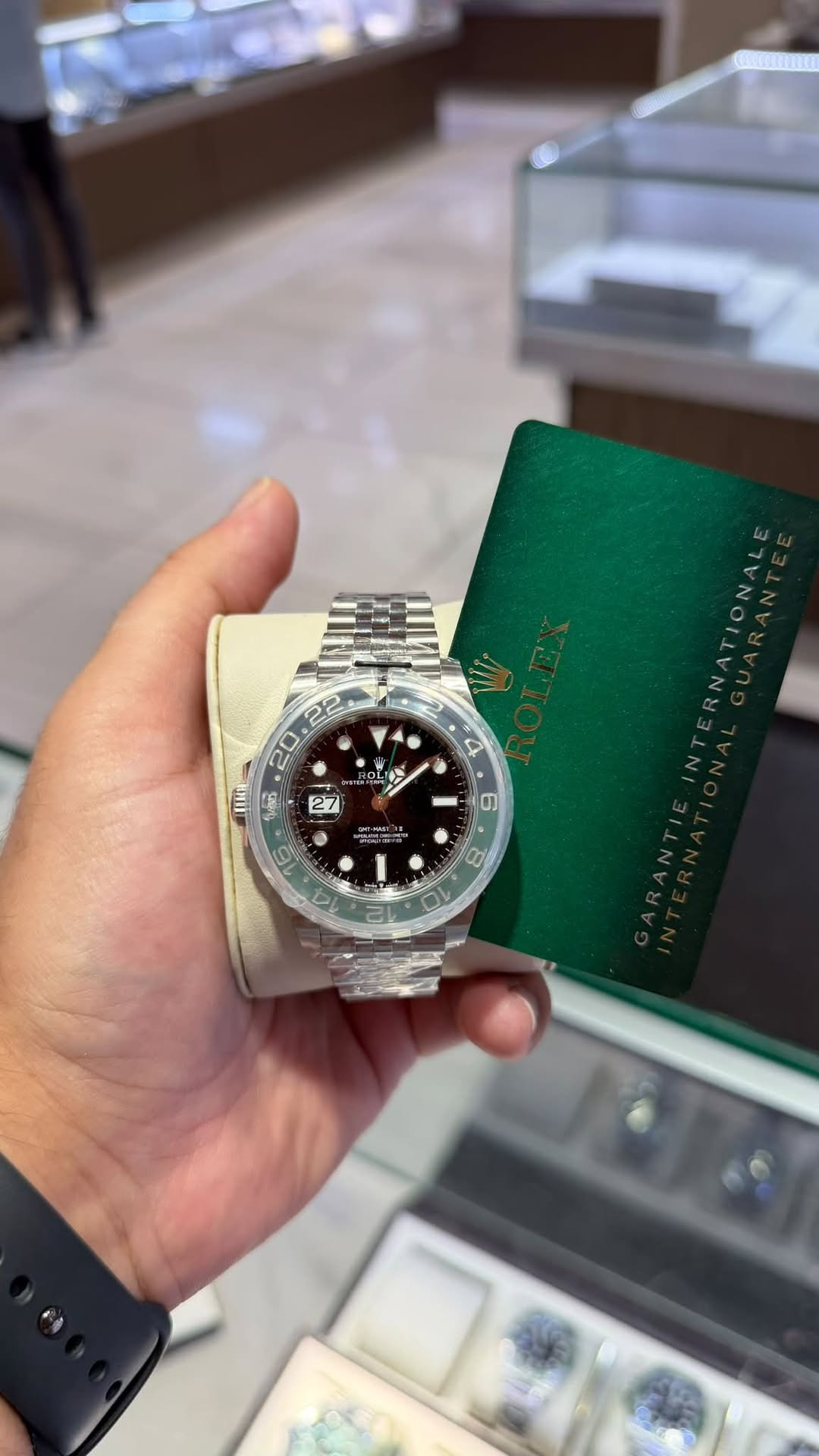 May be an image of wrist watch and text