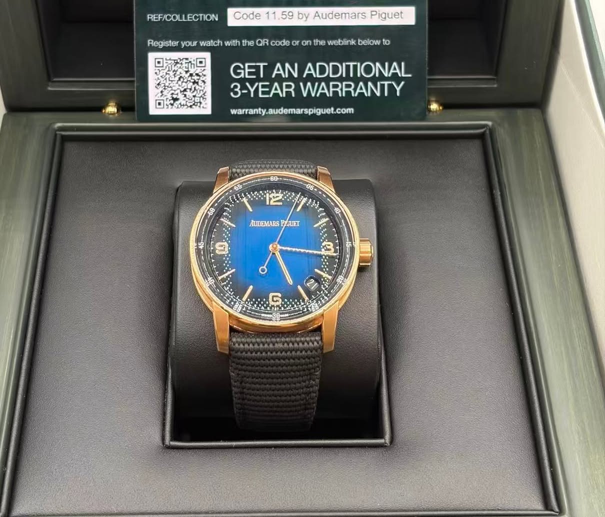 May be an image of digital watch and text that says 'REF/COLLECTION Code .59 by Audemars Piguet Register your watch with the QR code o on the weblink below to GET AN ADDITIONAL…