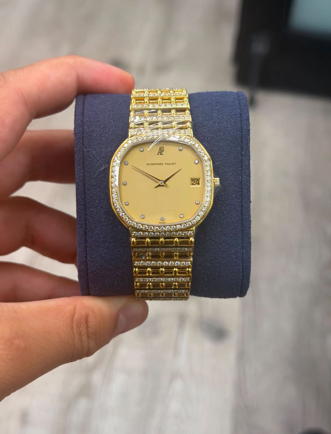 May be an image of wrist watch and text