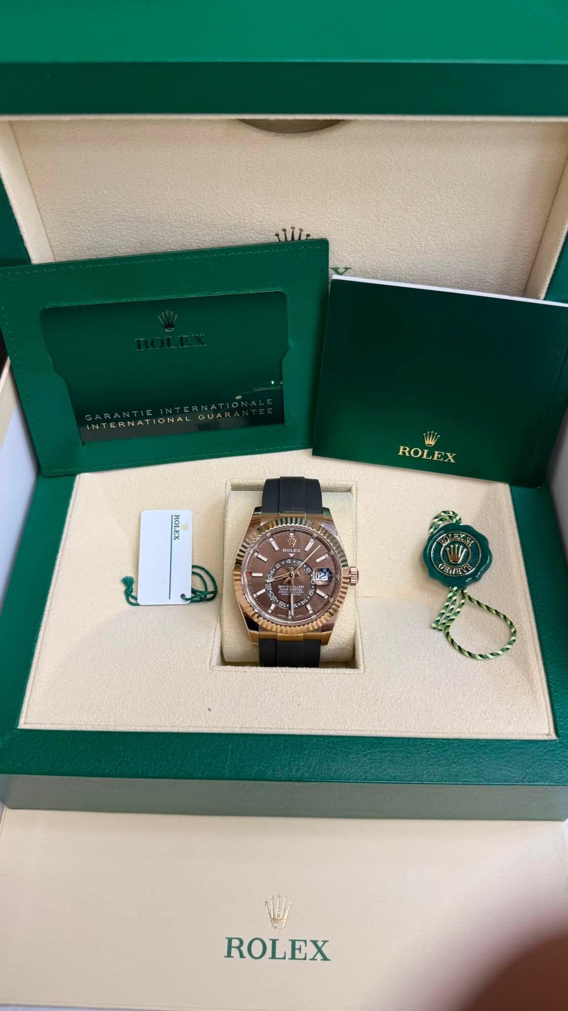 May be an image of wrist watch and text