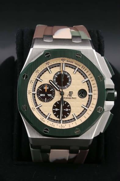 May be an image of wrist watch and text