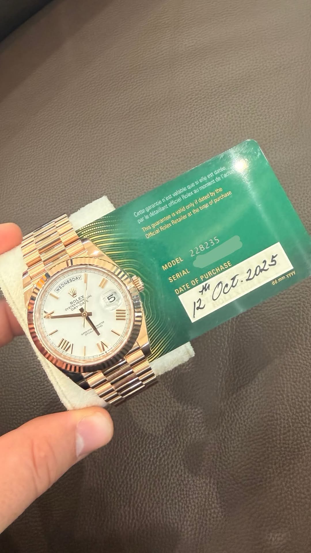 May be an image of wrist watch and text