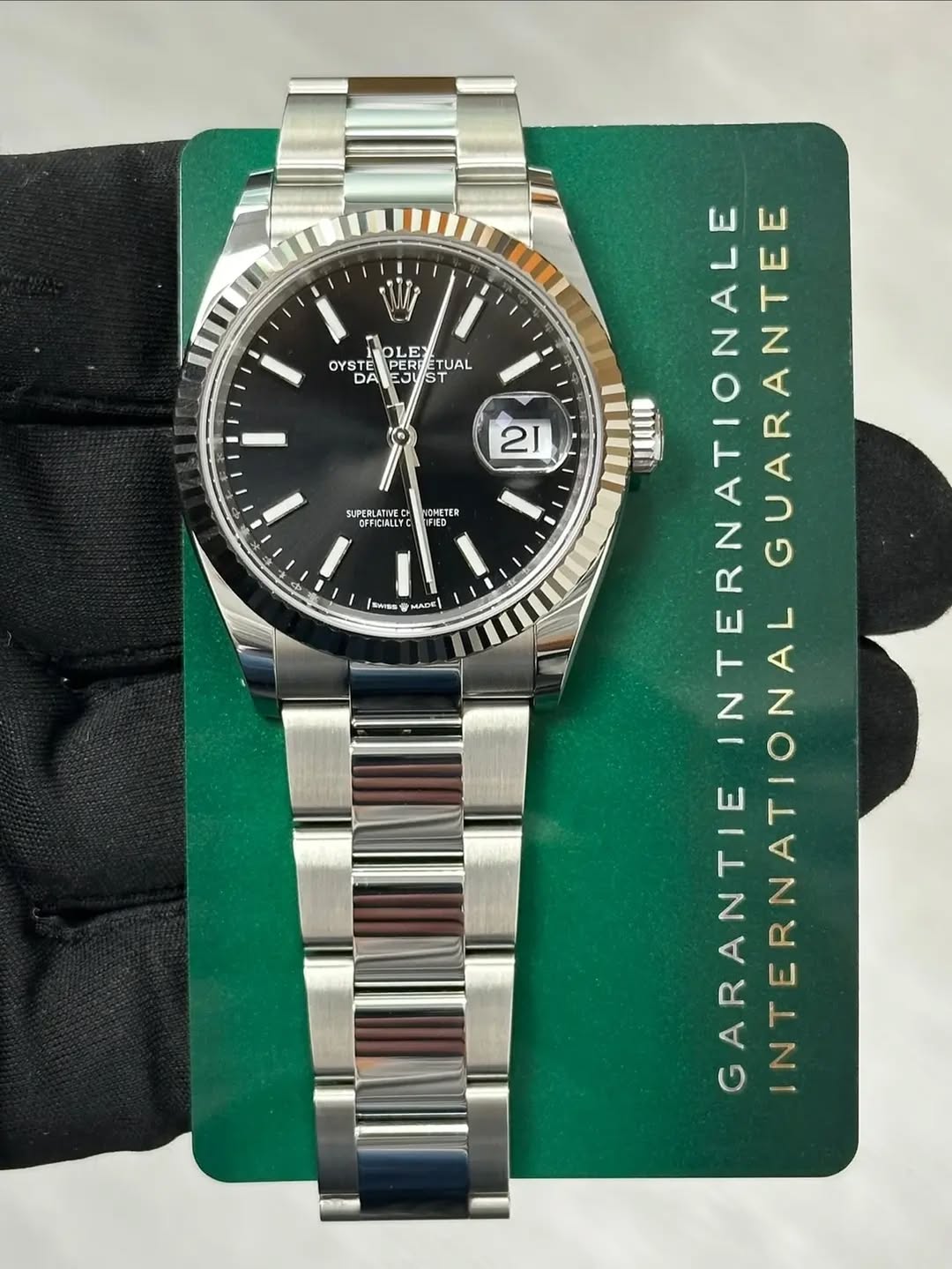 May be an image of wrist watch and text that says 'OYSTE SIP PLE PERDETUAL DED ETUAL DA Ξη OV ST ST 21 SNPERLATIVED CFFICIALLYC DHETER SeI6m こADE LATTET INTERNATIONALE NATIONALE…