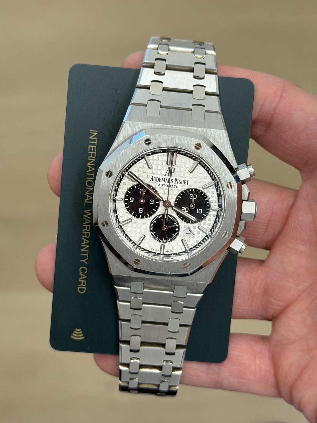 May be an image of wrist watch and text