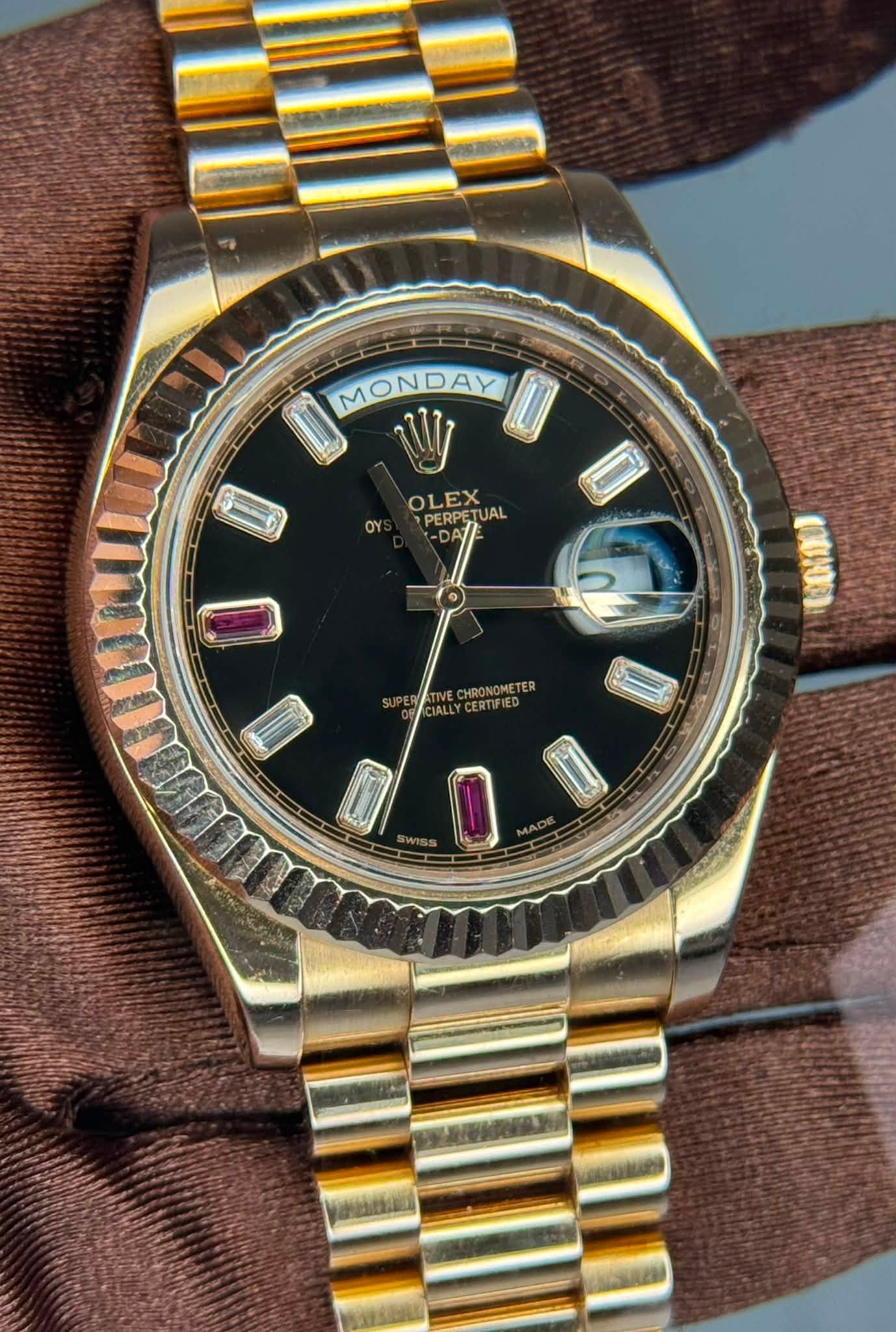 May be an image of wrist watch and text