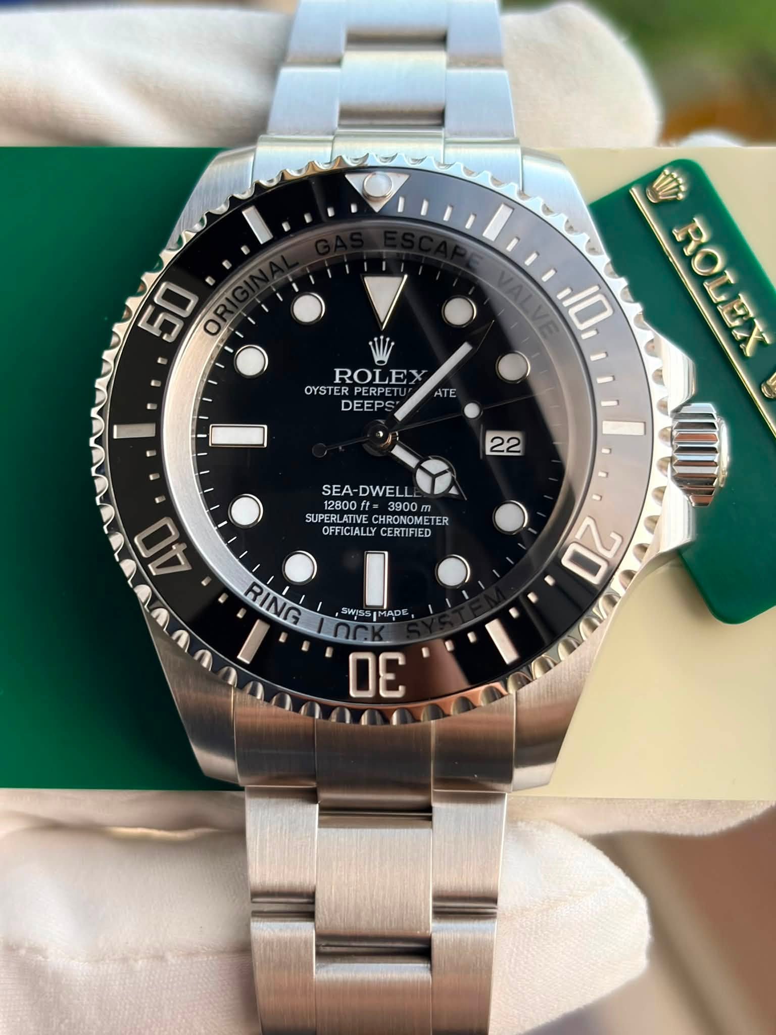 May be an image of wrist watch and text that says '50 OF I ROLEX ROLEX OYSTERPERPETU RPERPET PERPETU OYSTER DEEPS 10 ATE 22 SEA SEA-DWELL 12800f 3900 SUPERLATIVE…