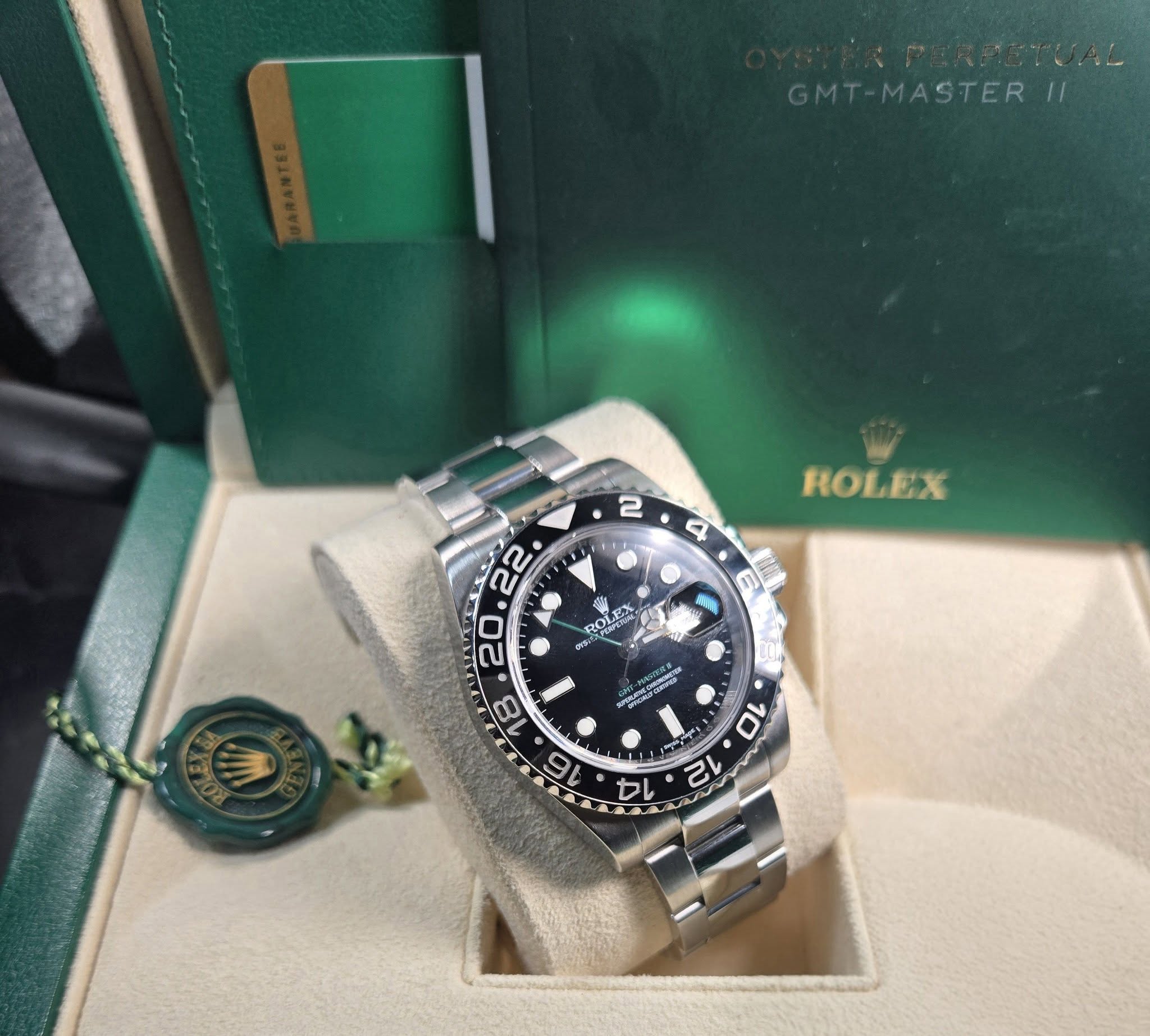 May be an image of wrist watch and text