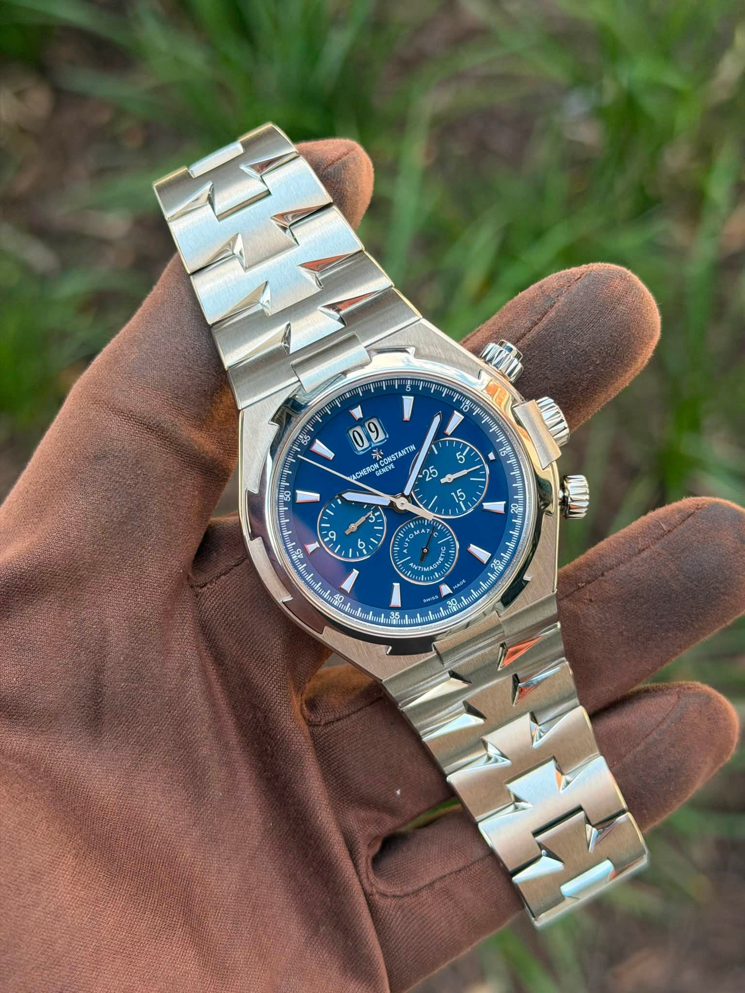 May be an image of wrist watch and text
