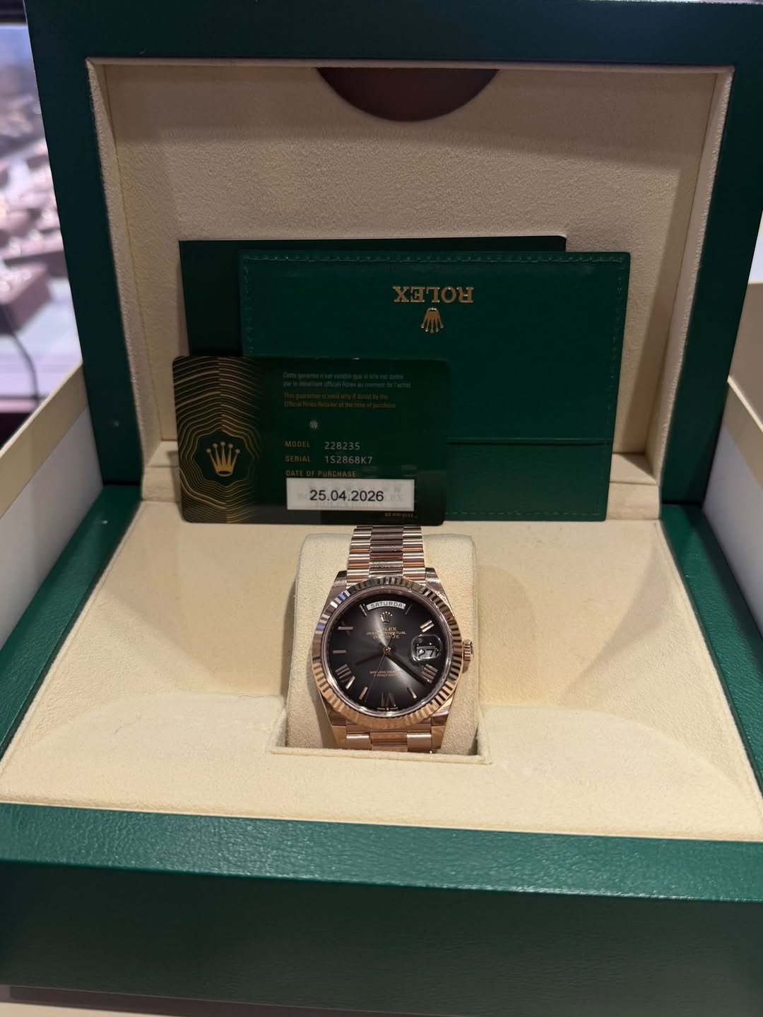 May be an image of wrist watch and text