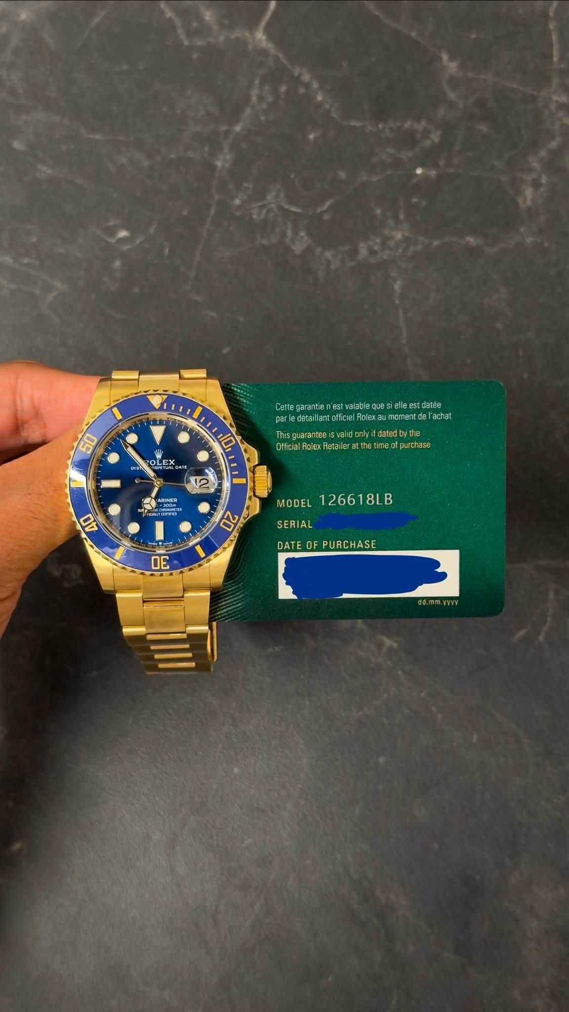 May be an image of wrist watch and text