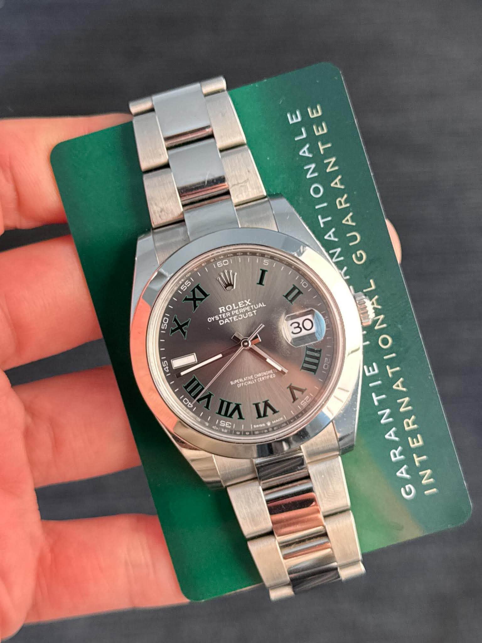 May be an image of wrist watch and text that says '55 50 30 ATIONALE E a GUARANTEE 60 5 W I 10 ROLEX OYS DANPERP YSTER STERPERPETUAL TERLEX DATEETUA GATEJUST PETUAL NAL III ㅇ간…
