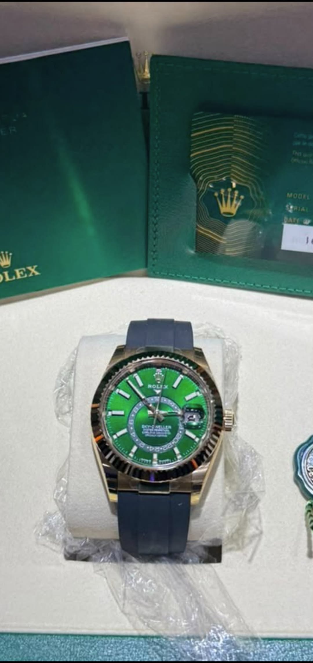 May be an image of wrist watch and text