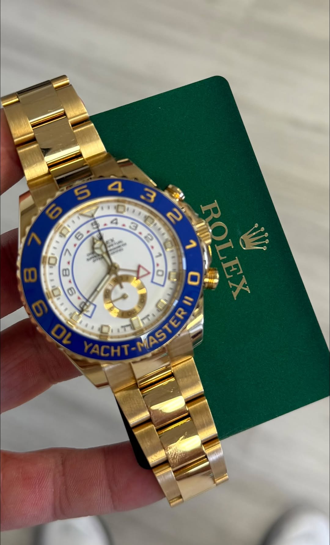 May be an image of wrist watch and text