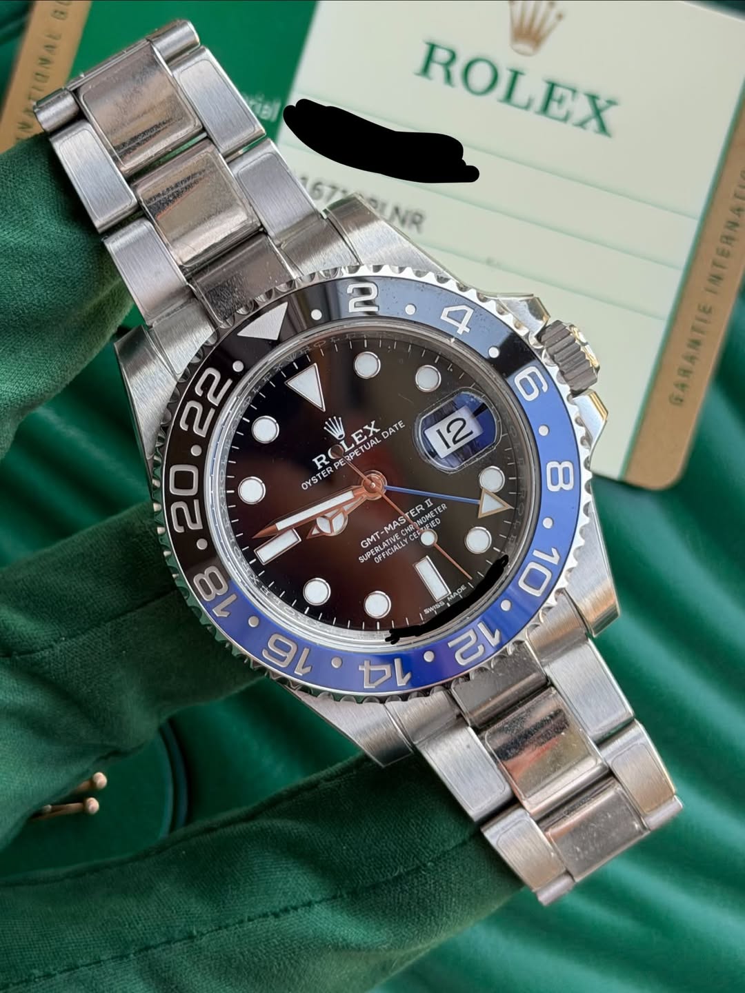 May be an image of wrist watch and text