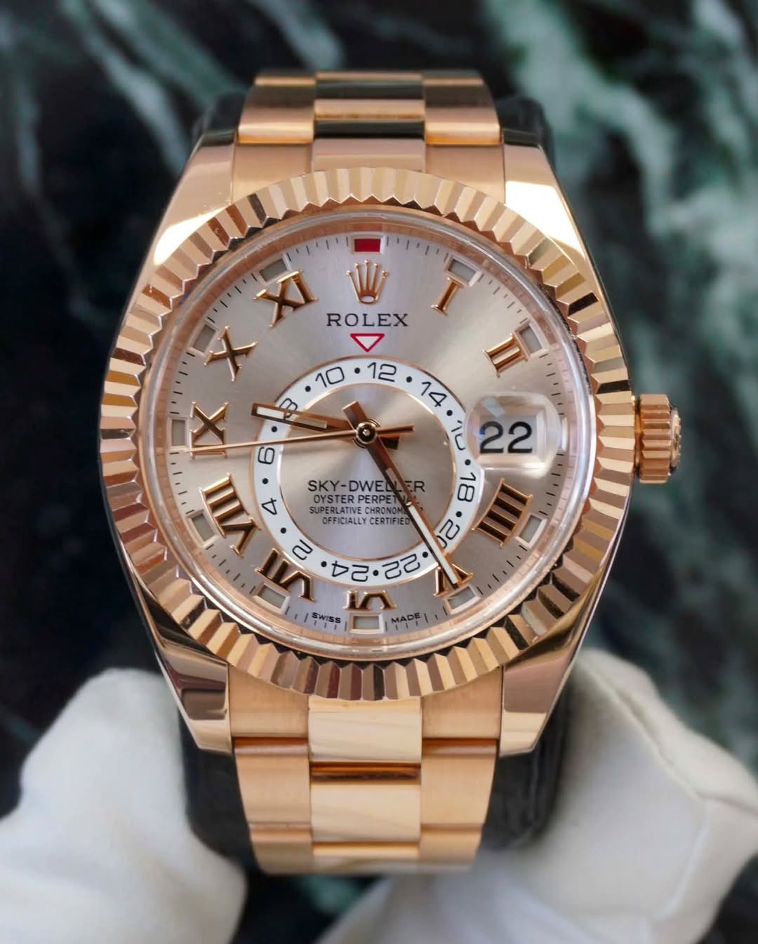 May be an image of wrist watch and text that says 'יויוין '니 XI W Z ROLEX I 10 12 II X IL 22 0 VIIII マ SKY-DWE SKY- DWEL OYSTE OTSTE PERPE SUPE 18 ERE ФeK URERLATIVE LIPERLATIVE…