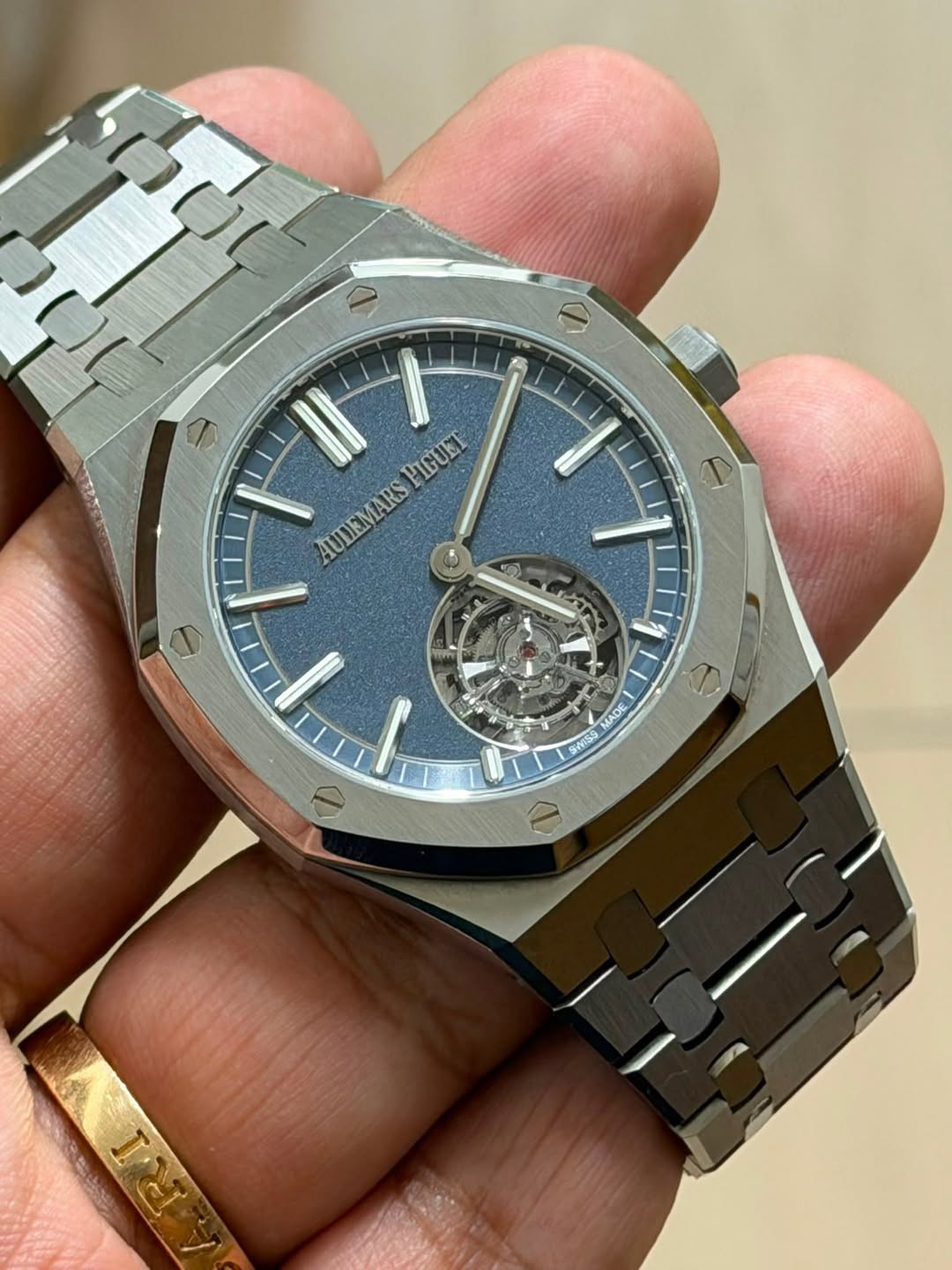 May be an image of wrist watch and text