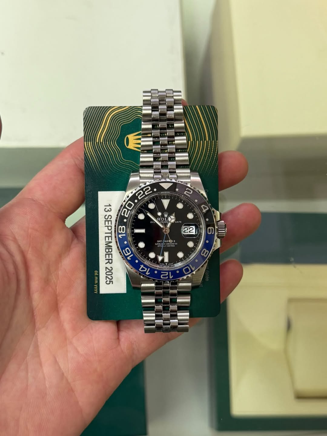 May be an image of wrist watch and text