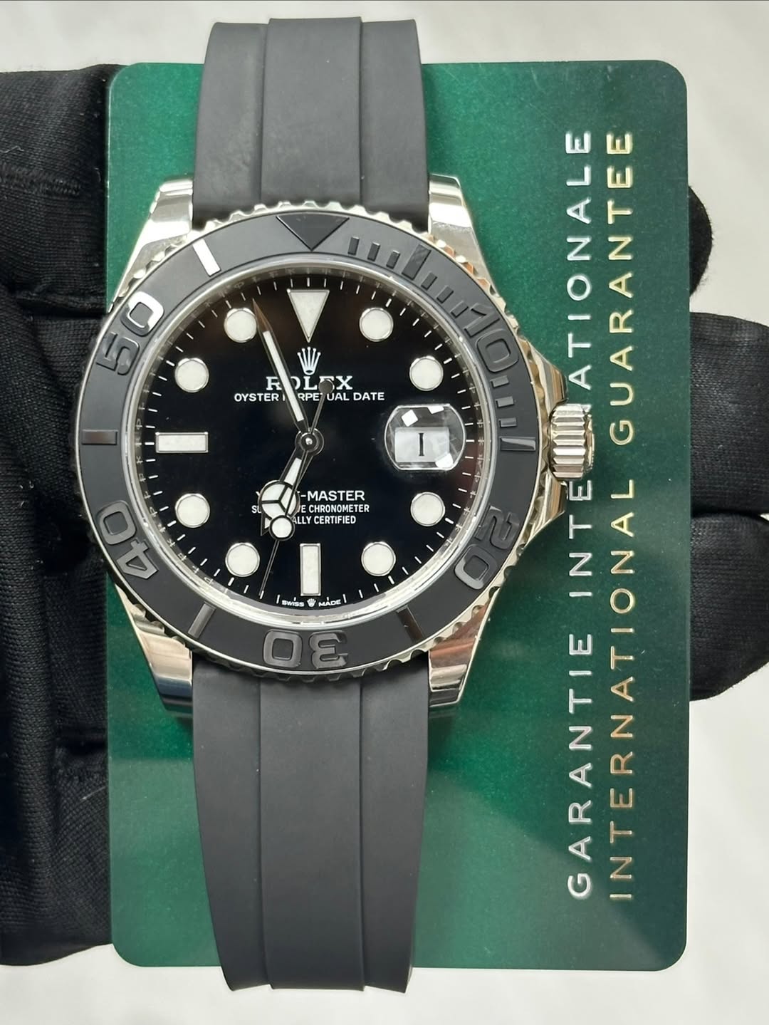 May be an image of wrist watch and text that says '5 50 0 Ex RD EX OYSTER RPE UAL DATE SL -MASTER CHRONOMETEI ETER کLیك CERTIFIED 40 ်္ေ MADIE 3 ATIONALE N ALGUARANTEE GUARANTEE…