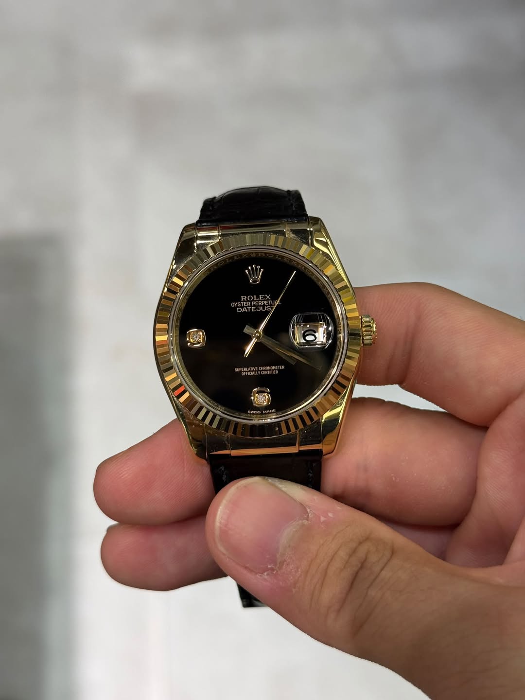 May be an image of digital watch and text