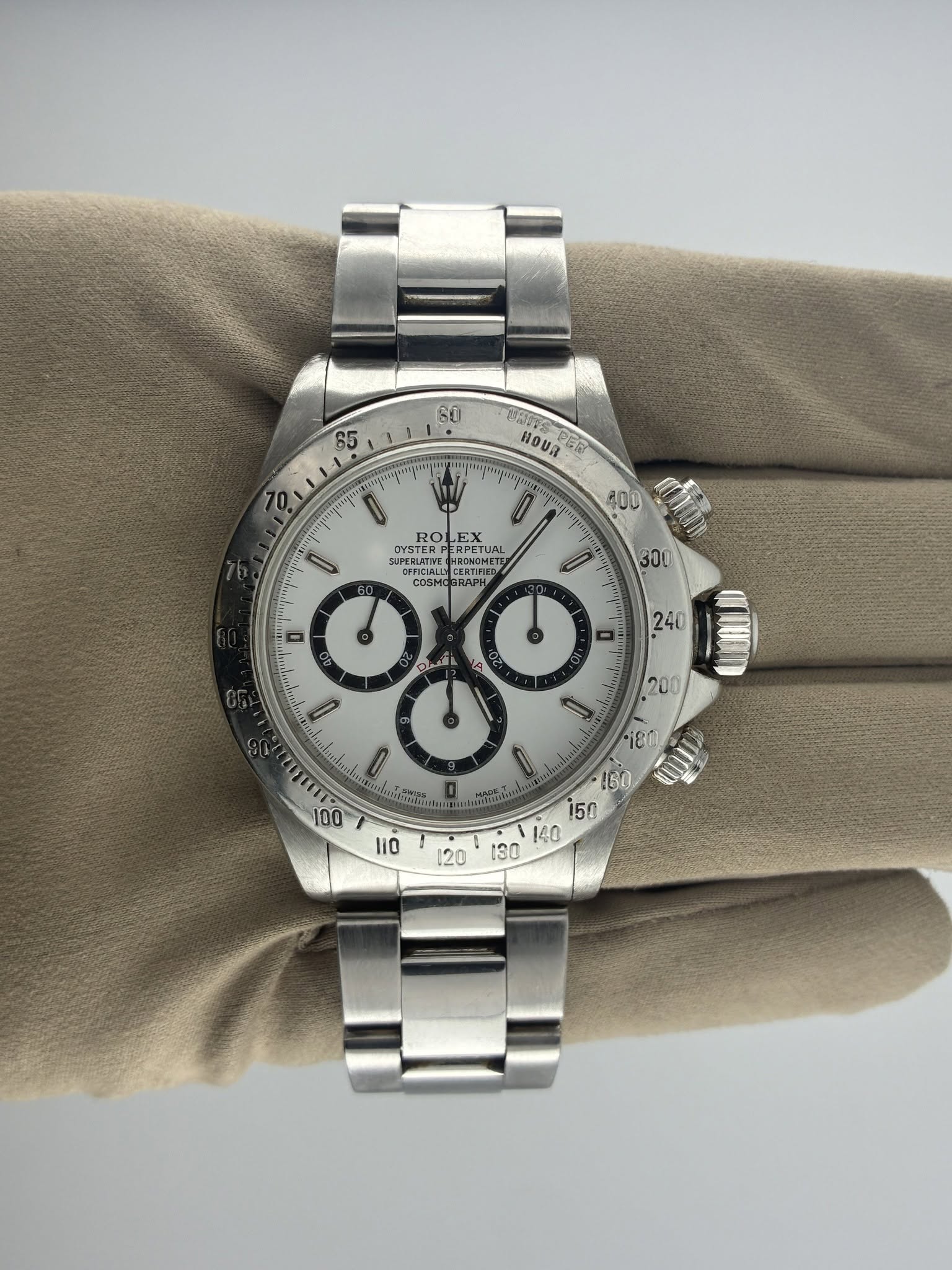May be an image of wrist watch and text
