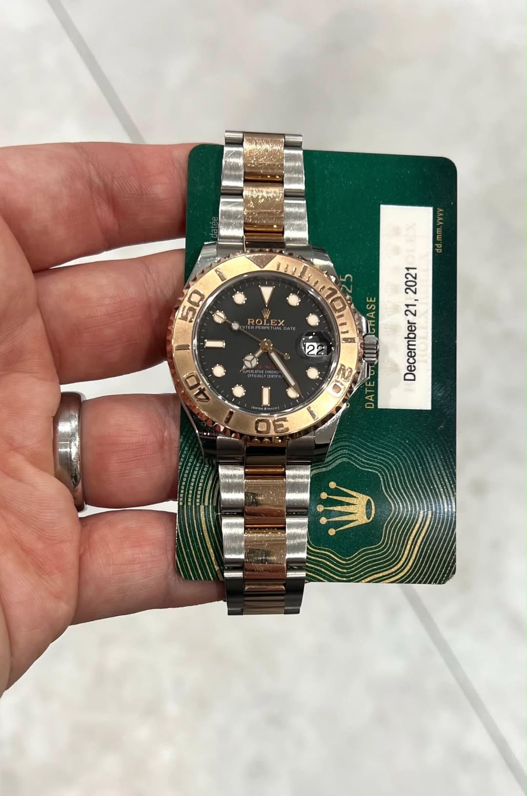 May be an image of wrist watch and text that says '50 ROLEX ー UEX dd.mm.yyvy 2021 21, December 22 RO ن DAT 30 ប'