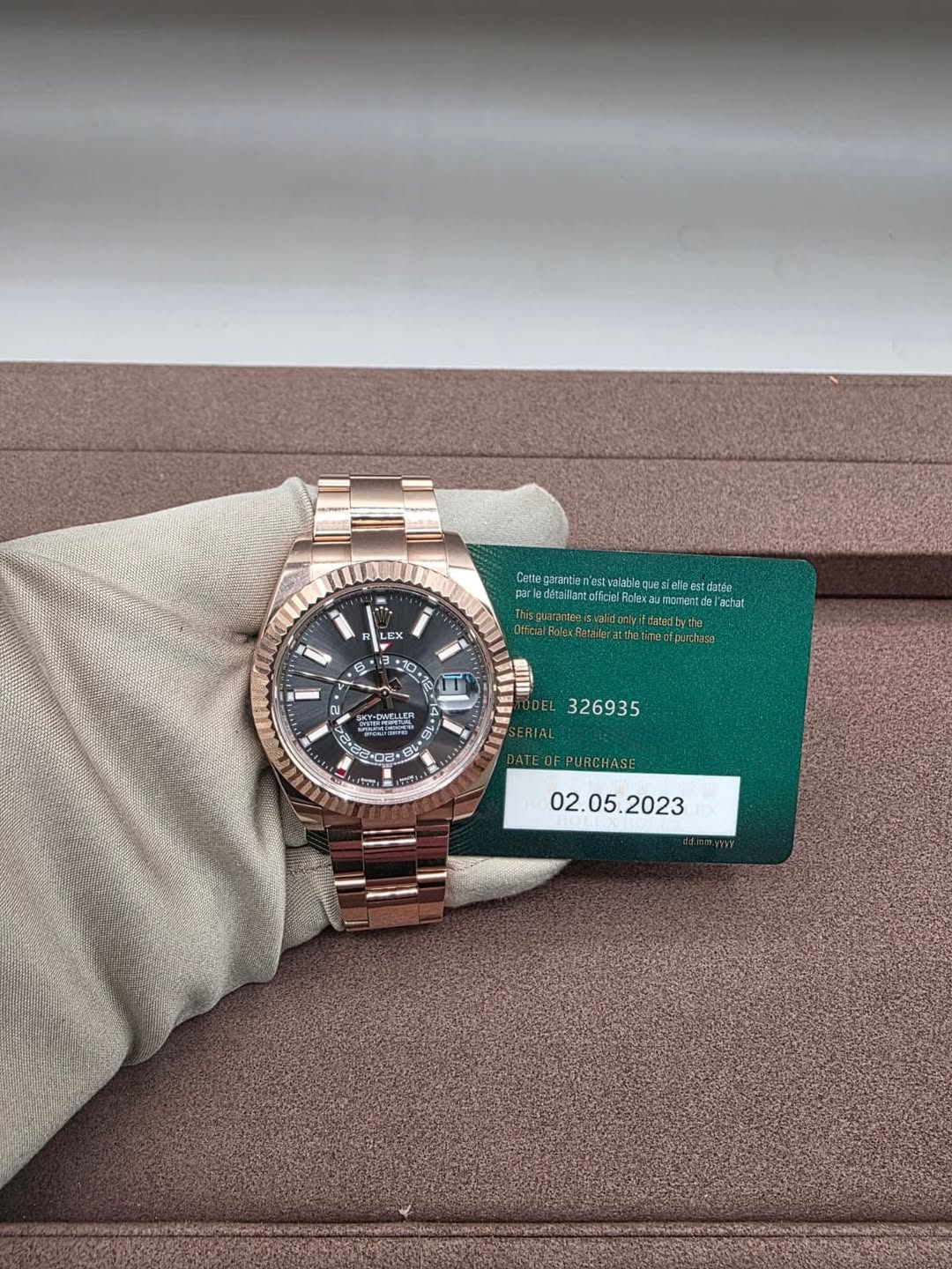 May be an image of wrist watch and text