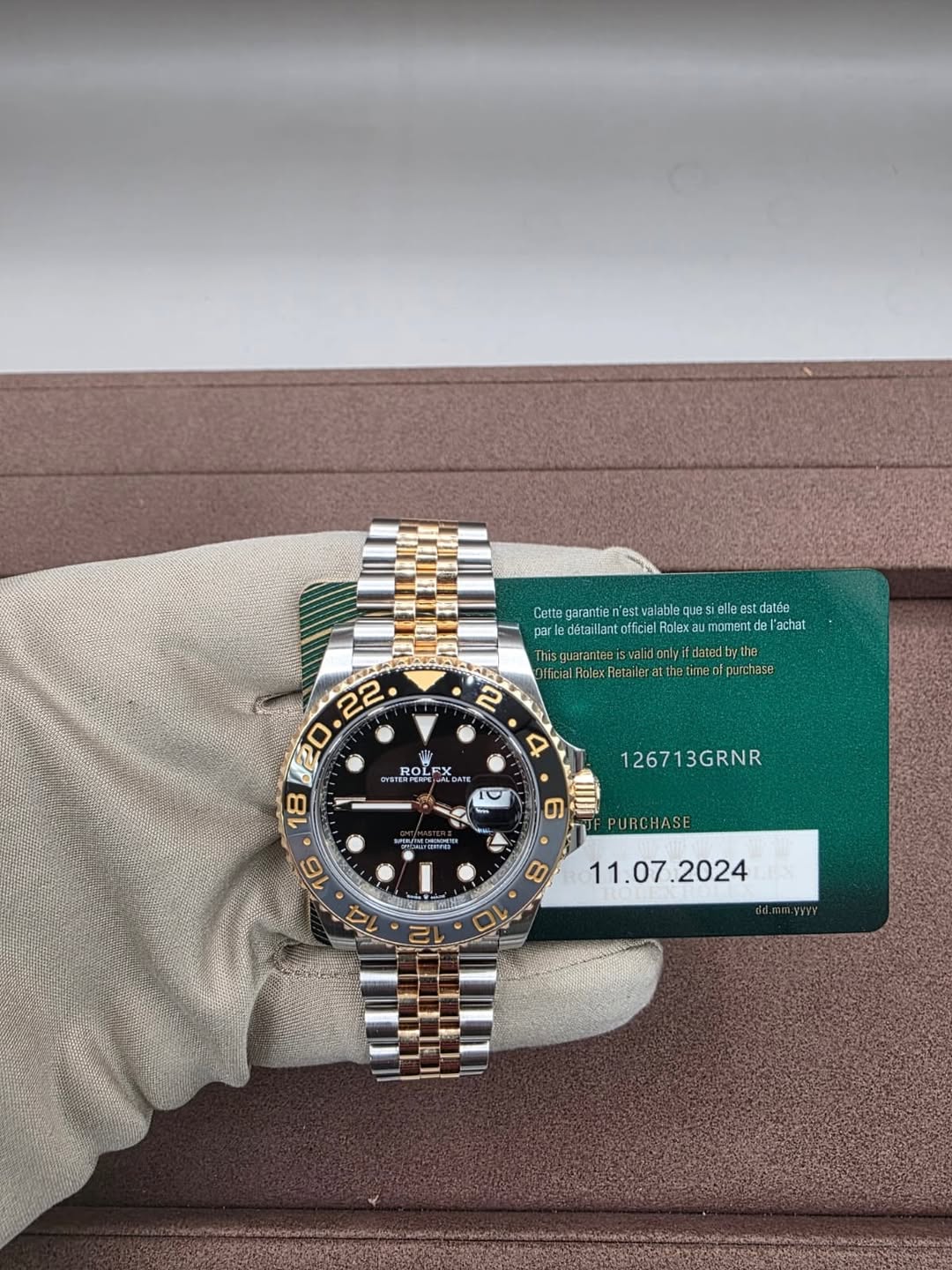May be an image of wrist watch and text